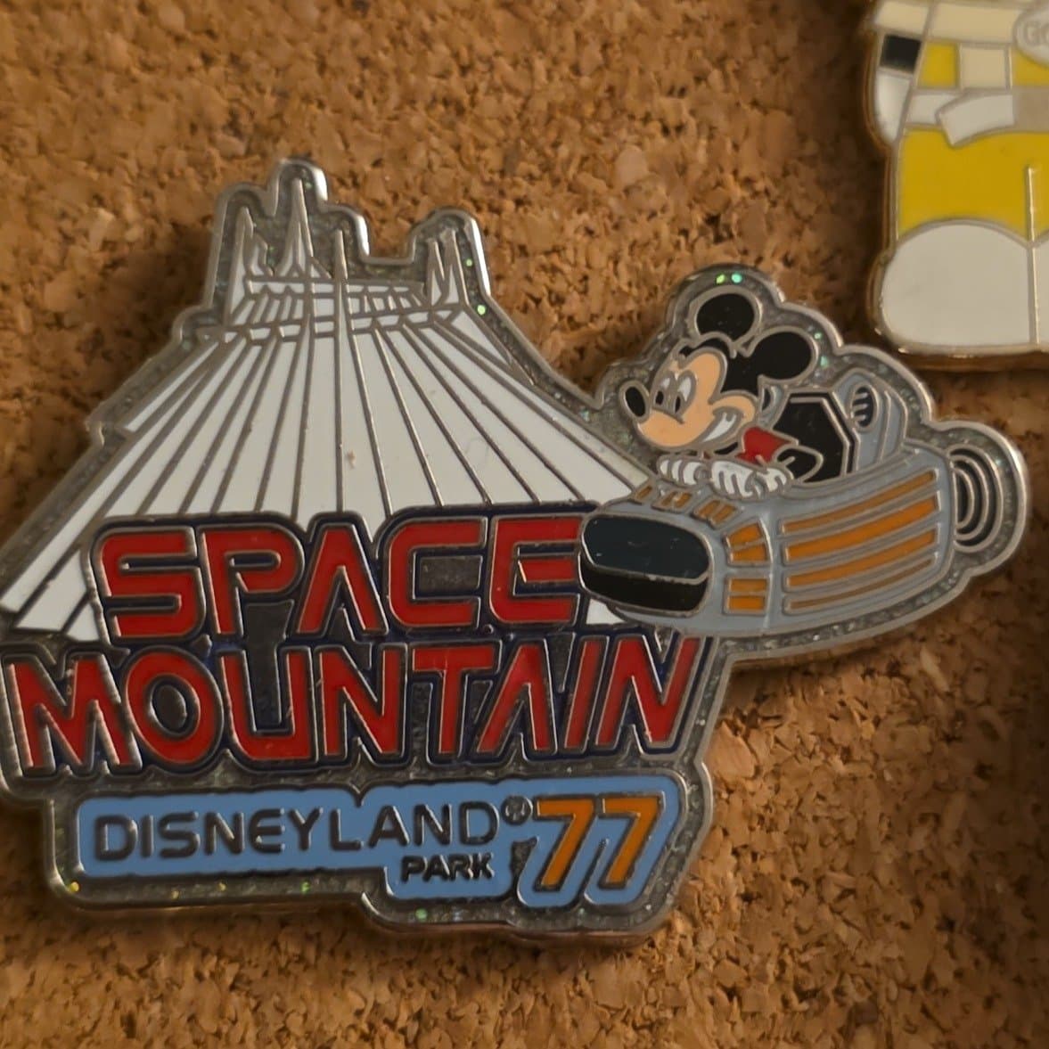 Space Mountain and Mickey Mouse front