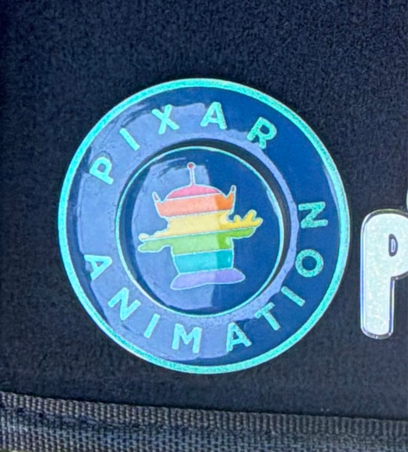 Pixar Animation Rainbow Alien Spinner front