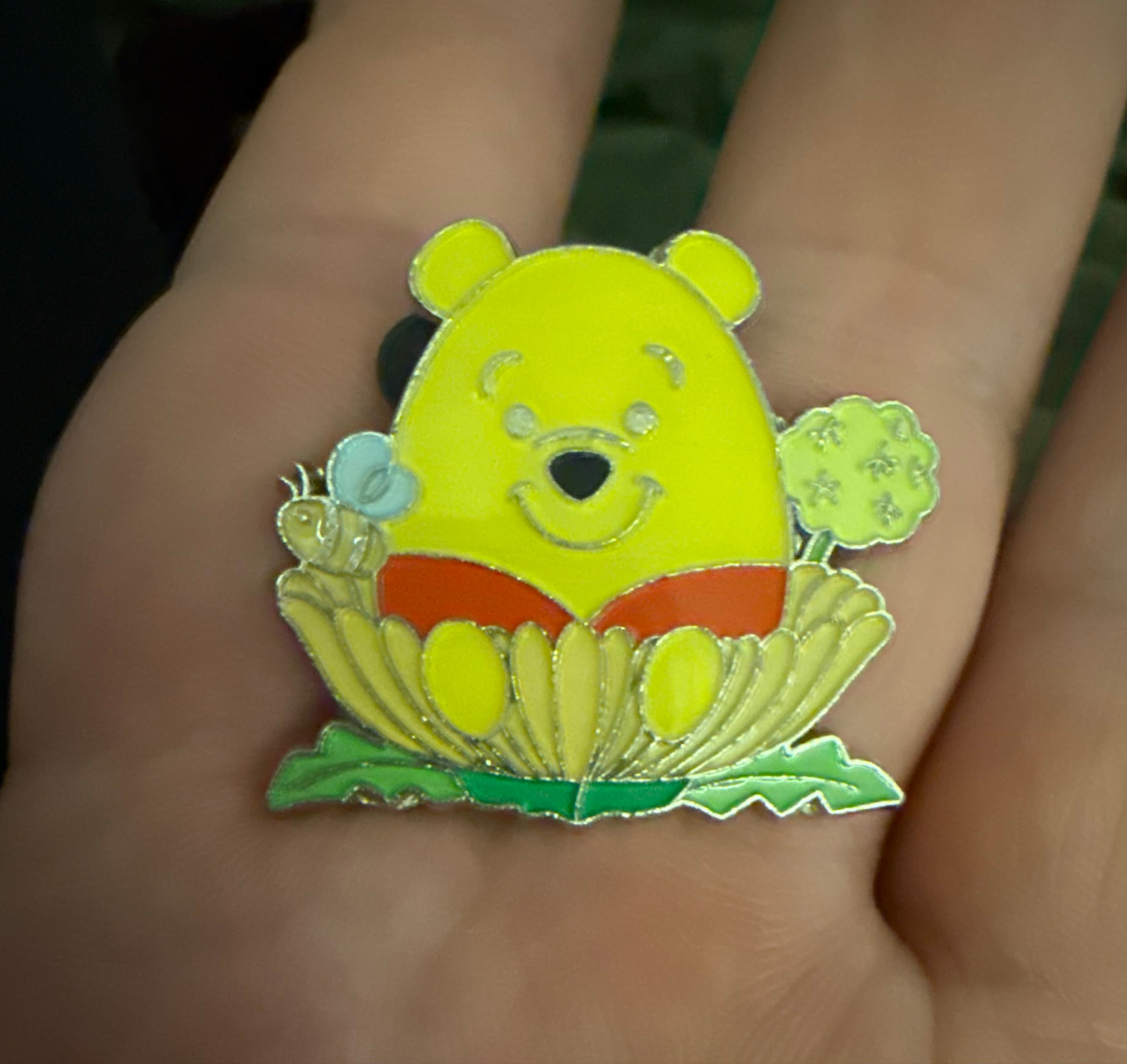 Winnie the Pooh in a Flower Garden with Bee front