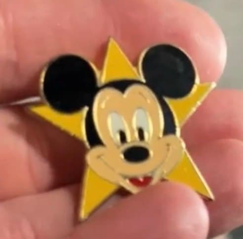 Mickey Mouse Head in Front of a Big Yellow Star front