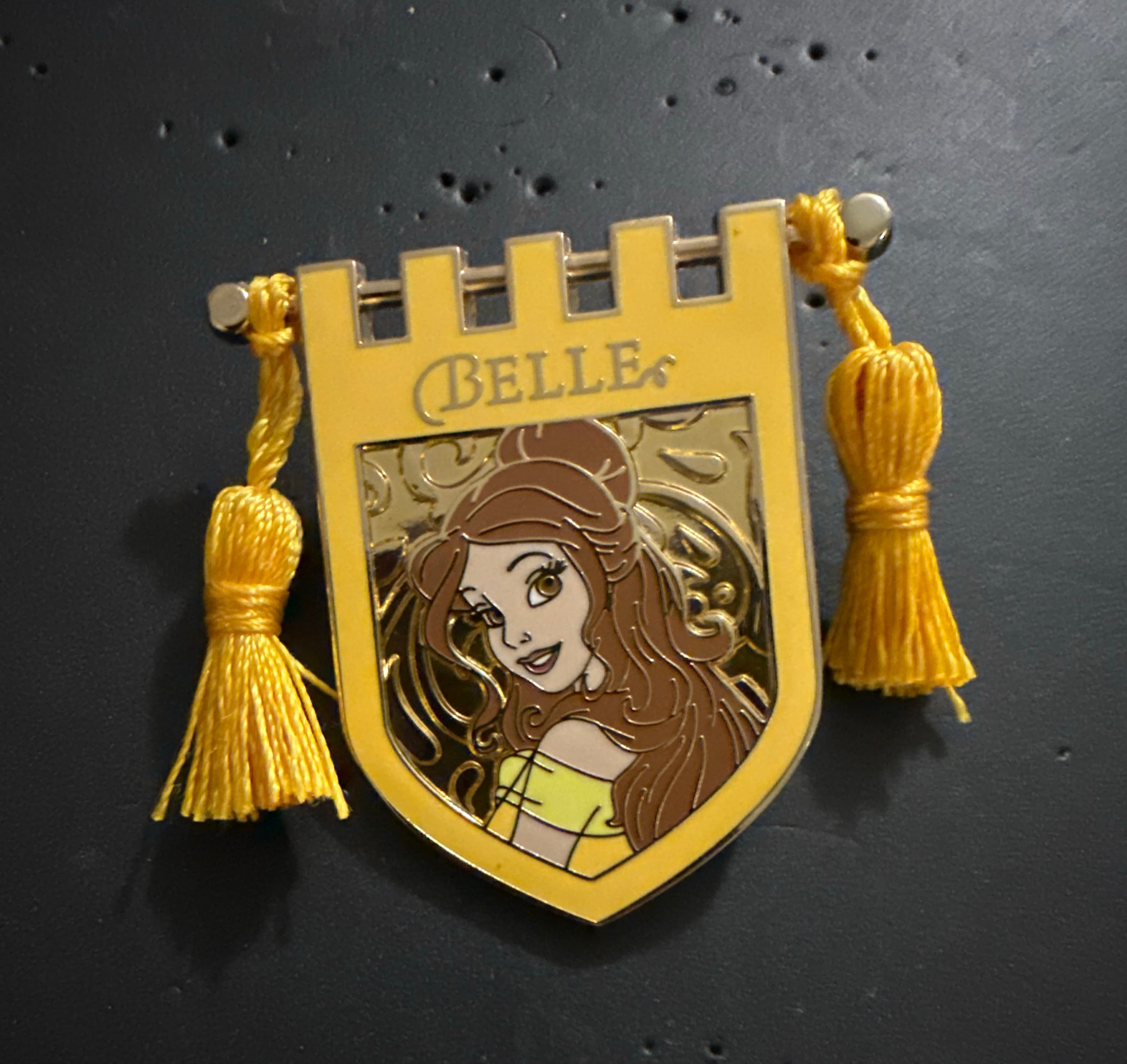 Princess Belle Crest Banner with Tassels Pin front