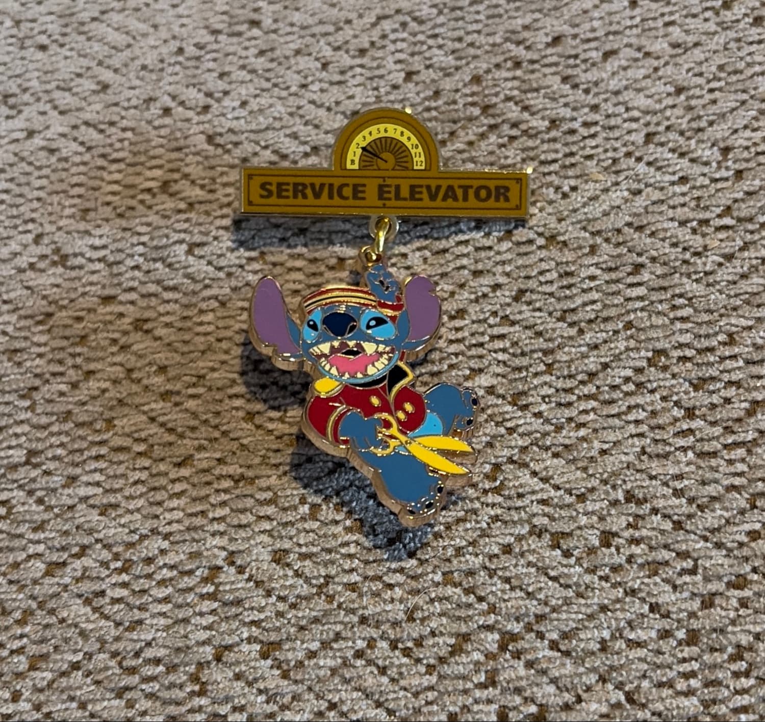 Bellhop Stitch Dangling From Service Elevator Sign front