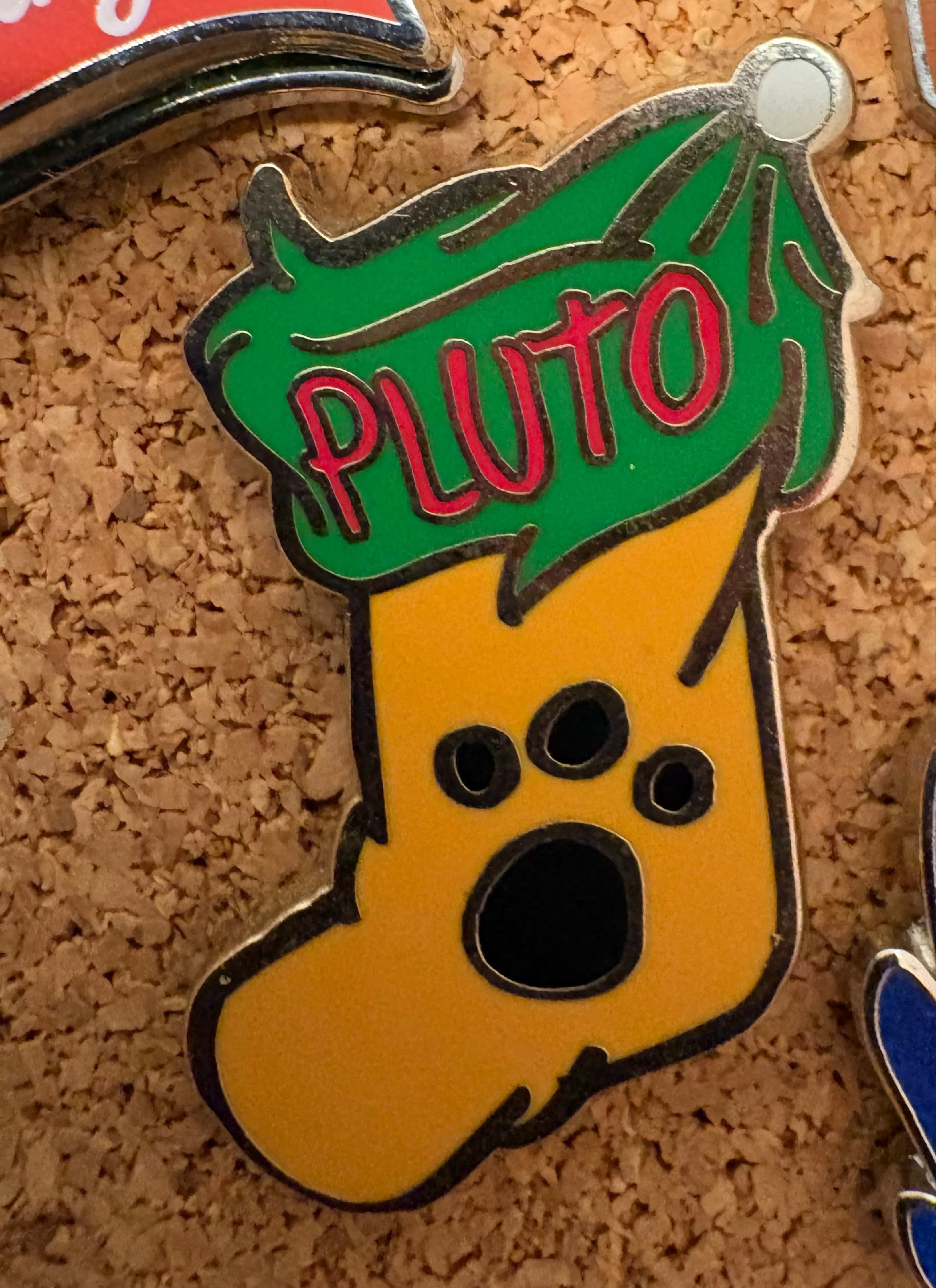Pluto Holiday Stocking Pin front