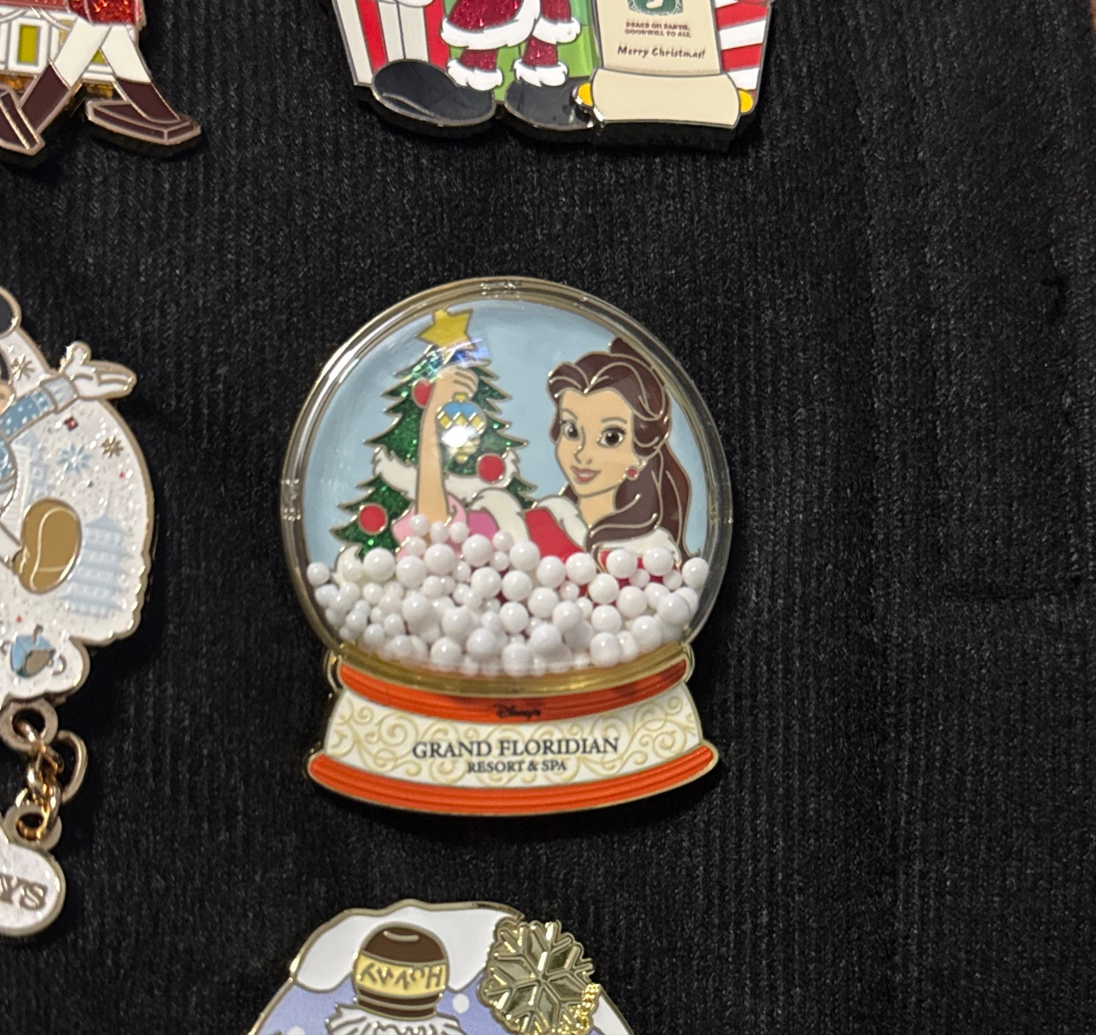 Belle Grand Floridian Resort 2025 Happy Holidays Snow Globe Pin front