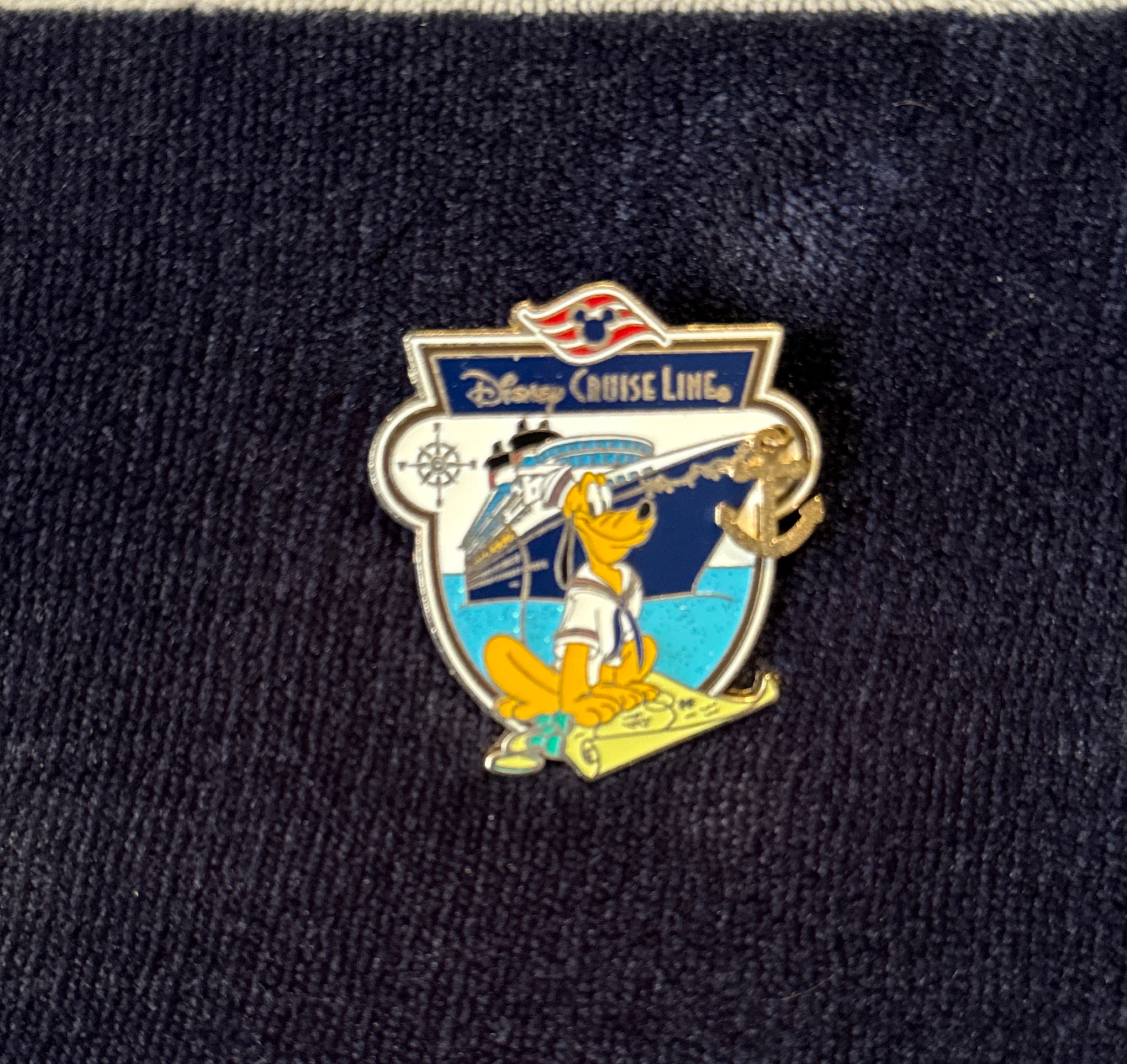 Pluto Sitting on Map with Ship - Disney Cruise Line front