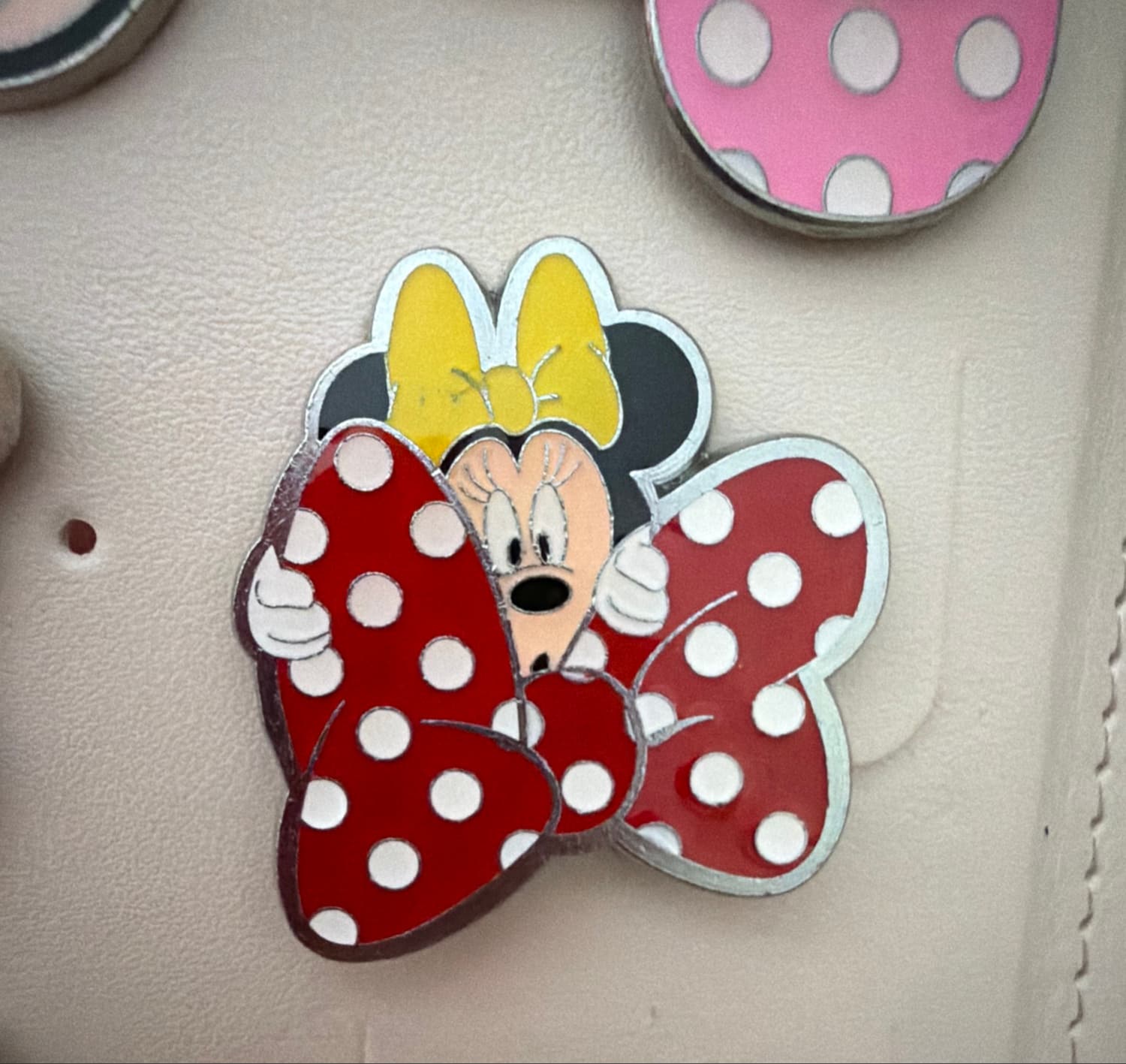 Minnie Mouse Peeking from Behind a Red Polka-Dot Bow by MII front