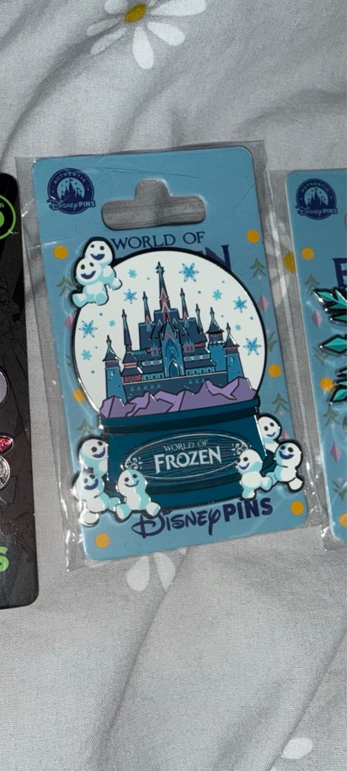 World of Frozen Snowgies Snow Globe Pin front