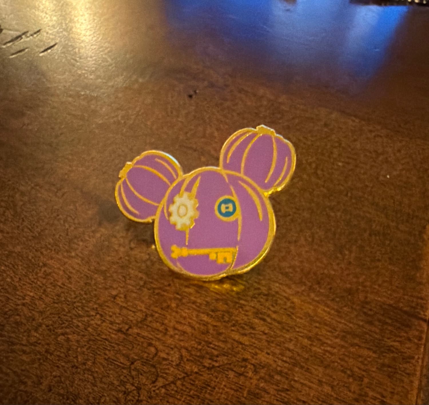 Purple Stitched Mickey Mouse Halloween Icon Pin with Gear Eye and Key Mouth front