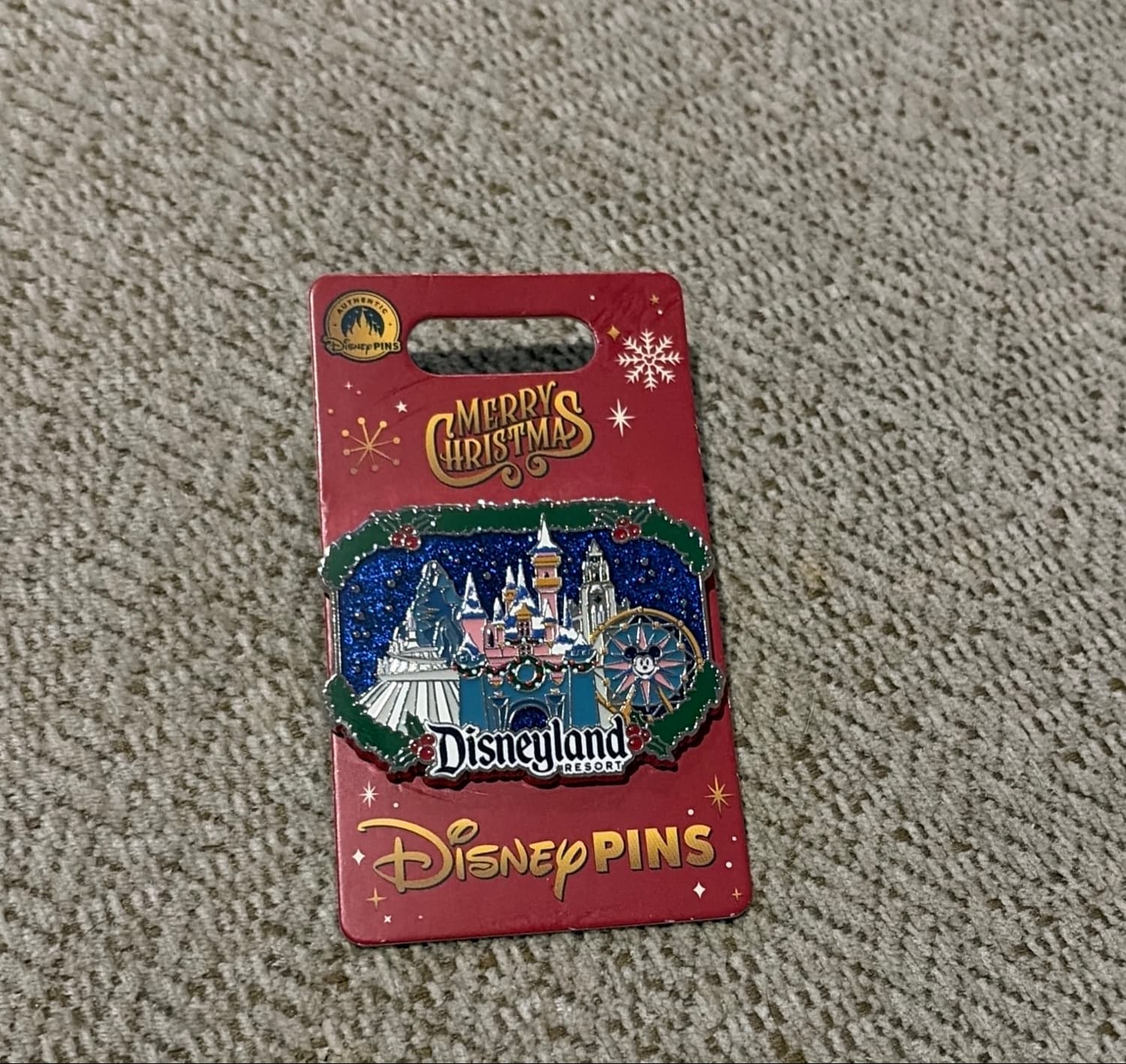 Disneyland Resort Christmas Wreath with Sleeping Beauty Castle, Matterhorn, and Pixar Pal-A-Round front