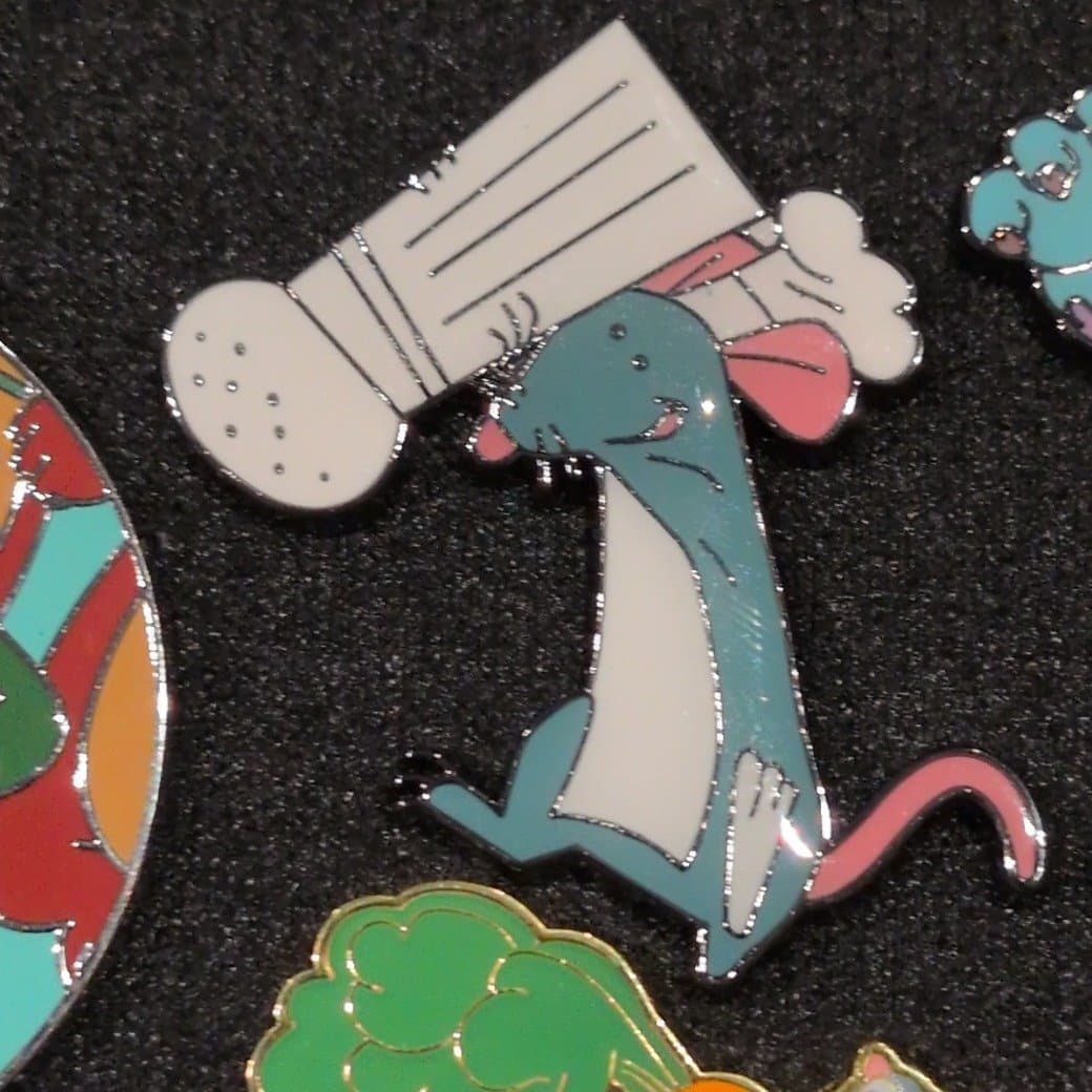 Remy Holding Salt Shaker Pin front
