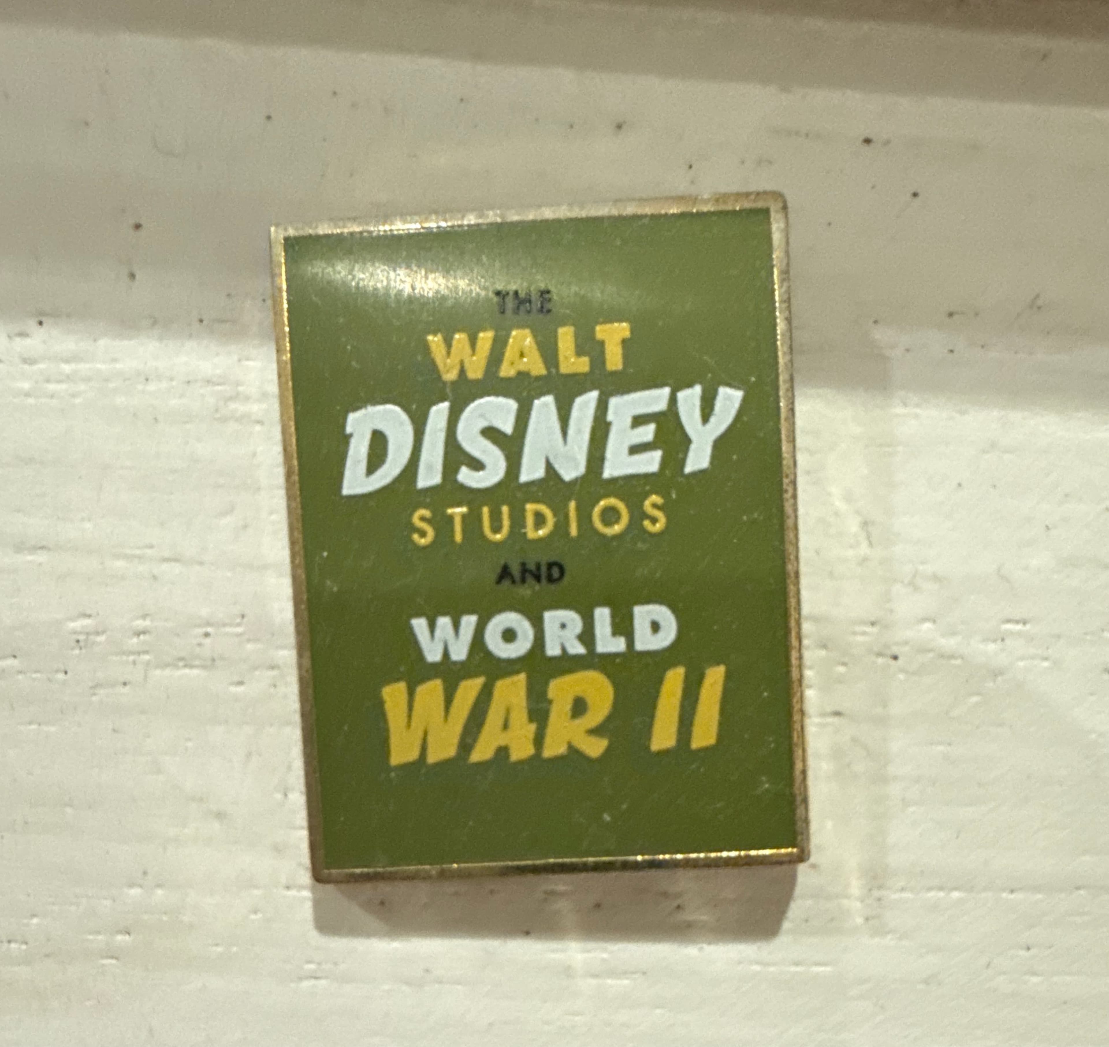 The Walt Disney Studios and World War II Exhibition Title Logo Pin front