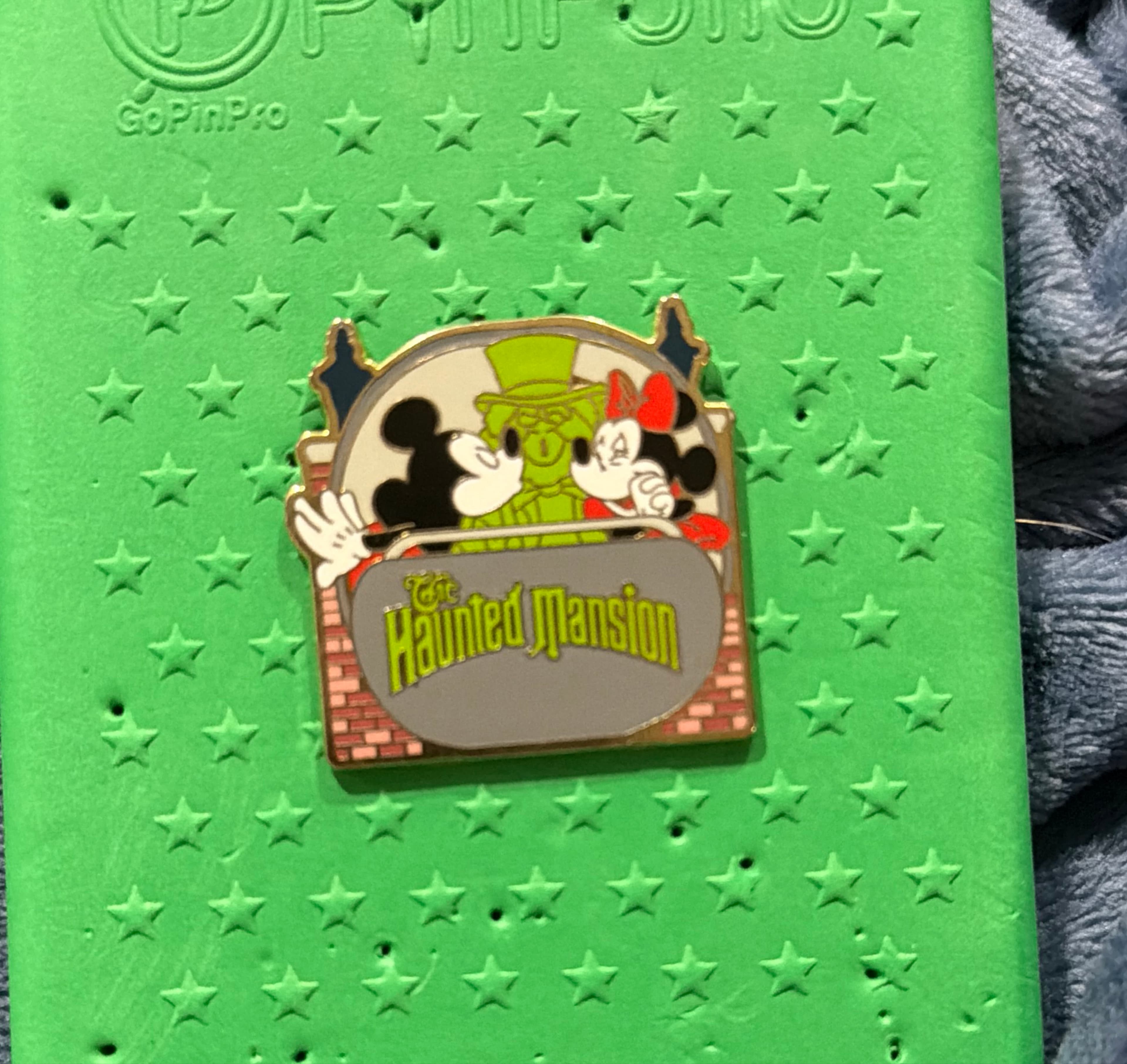 Mickey and Minnie Mouse with Hatbox Ghost - The Haunted Mansion Sign front