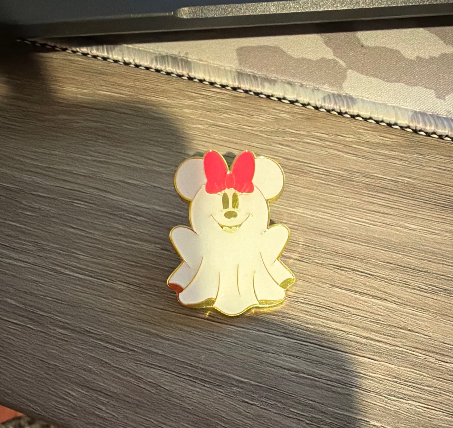 Loungefly Disney Ghosts Glow-in-the-Dark Minnie Mouse Bow Pin front