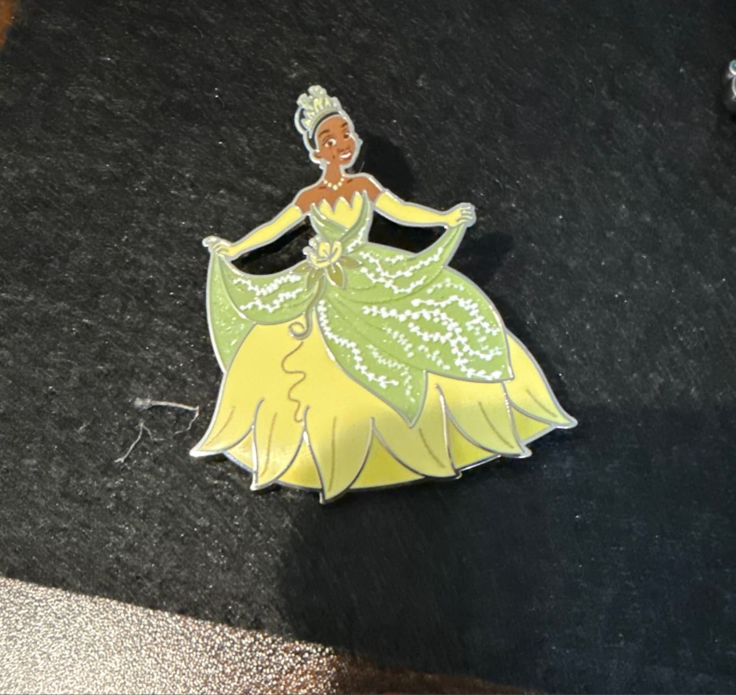 Tiana Holding Green Dress front