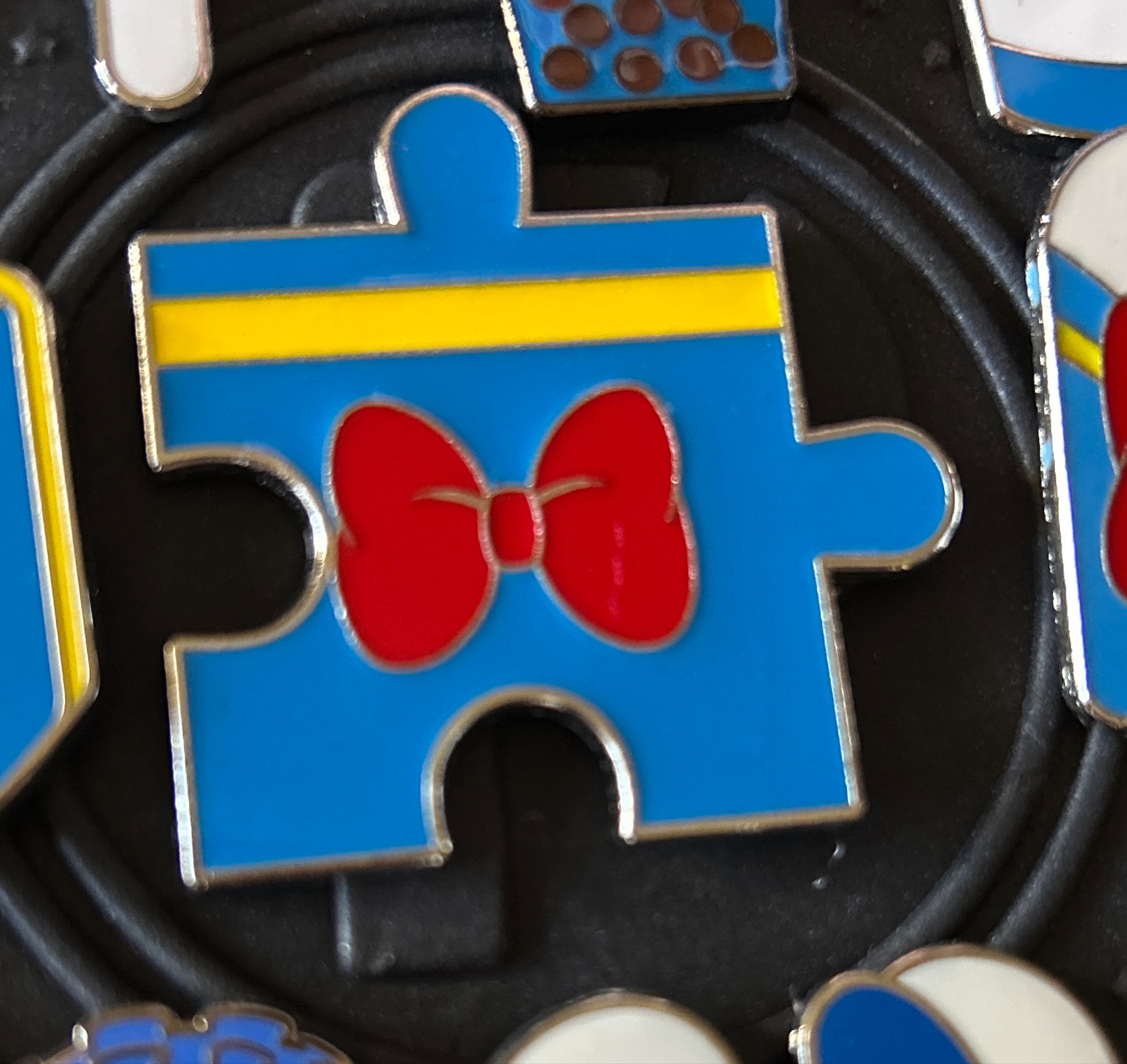 Donald Duck Puzzle Piece Hidden Mickey Pin front