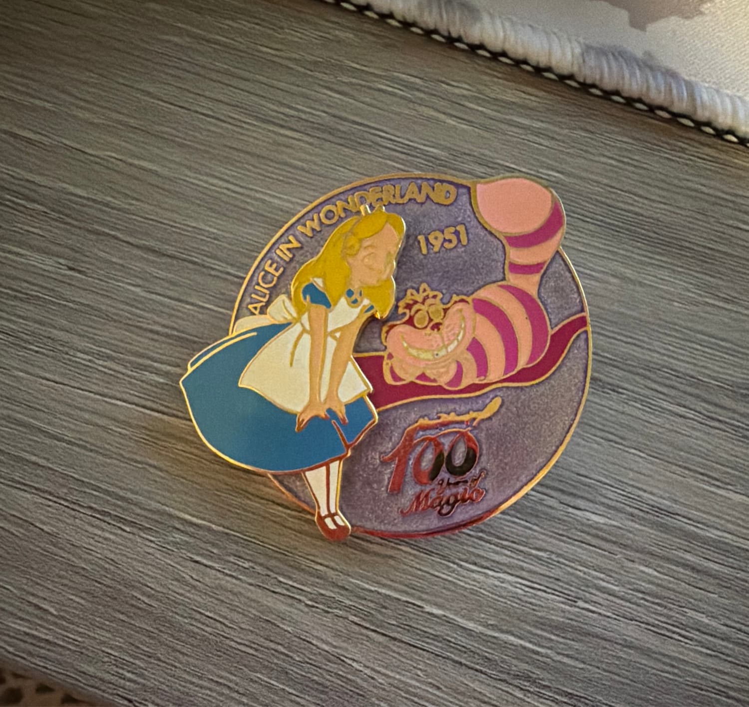 Alice in Wonderland Cheshire Cat 100 Years of Magic Pin front