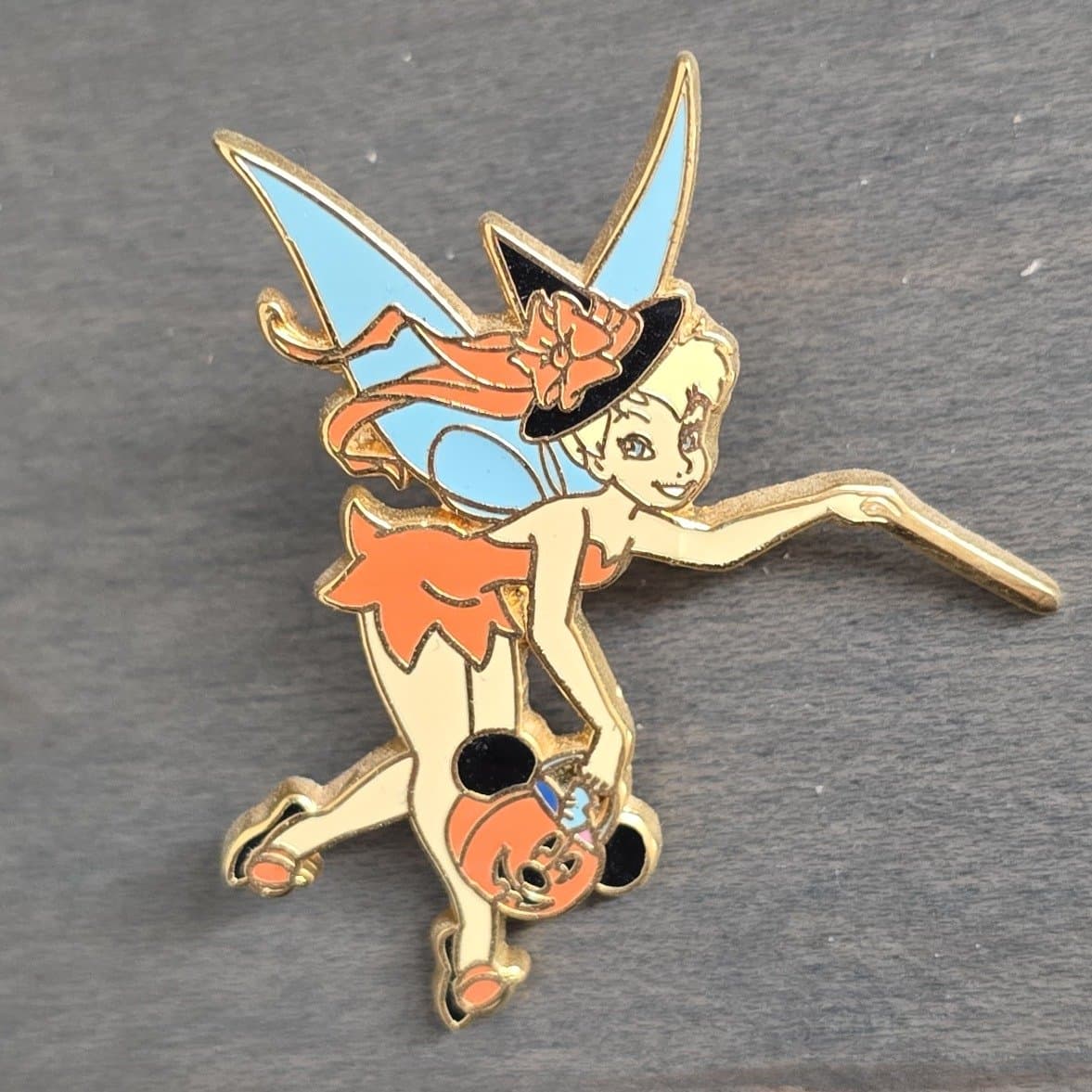 Tinker Bell Wearing an Orange Witch Costume front