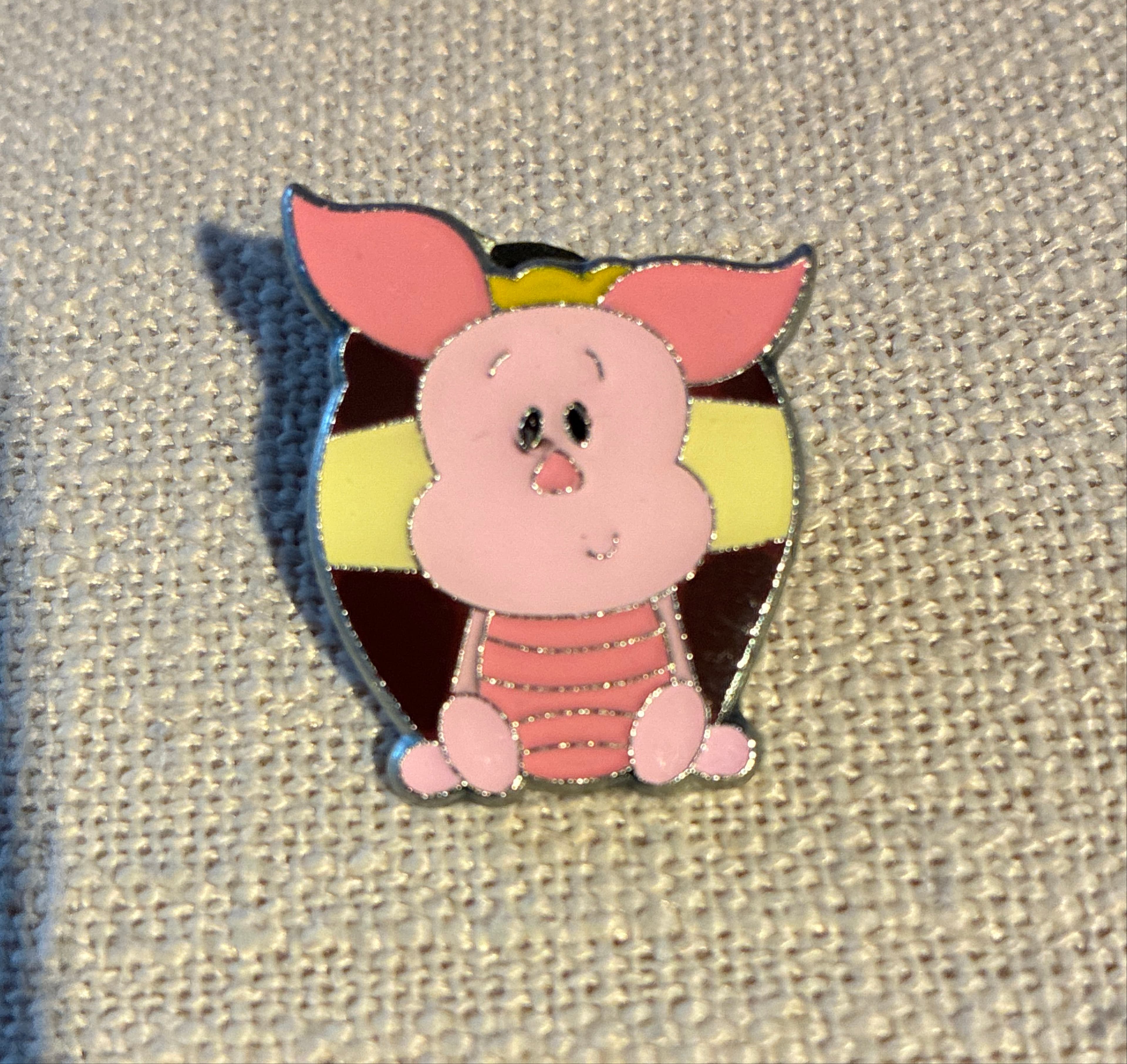 Piglet with Crown on Striped Honey Pot Background front