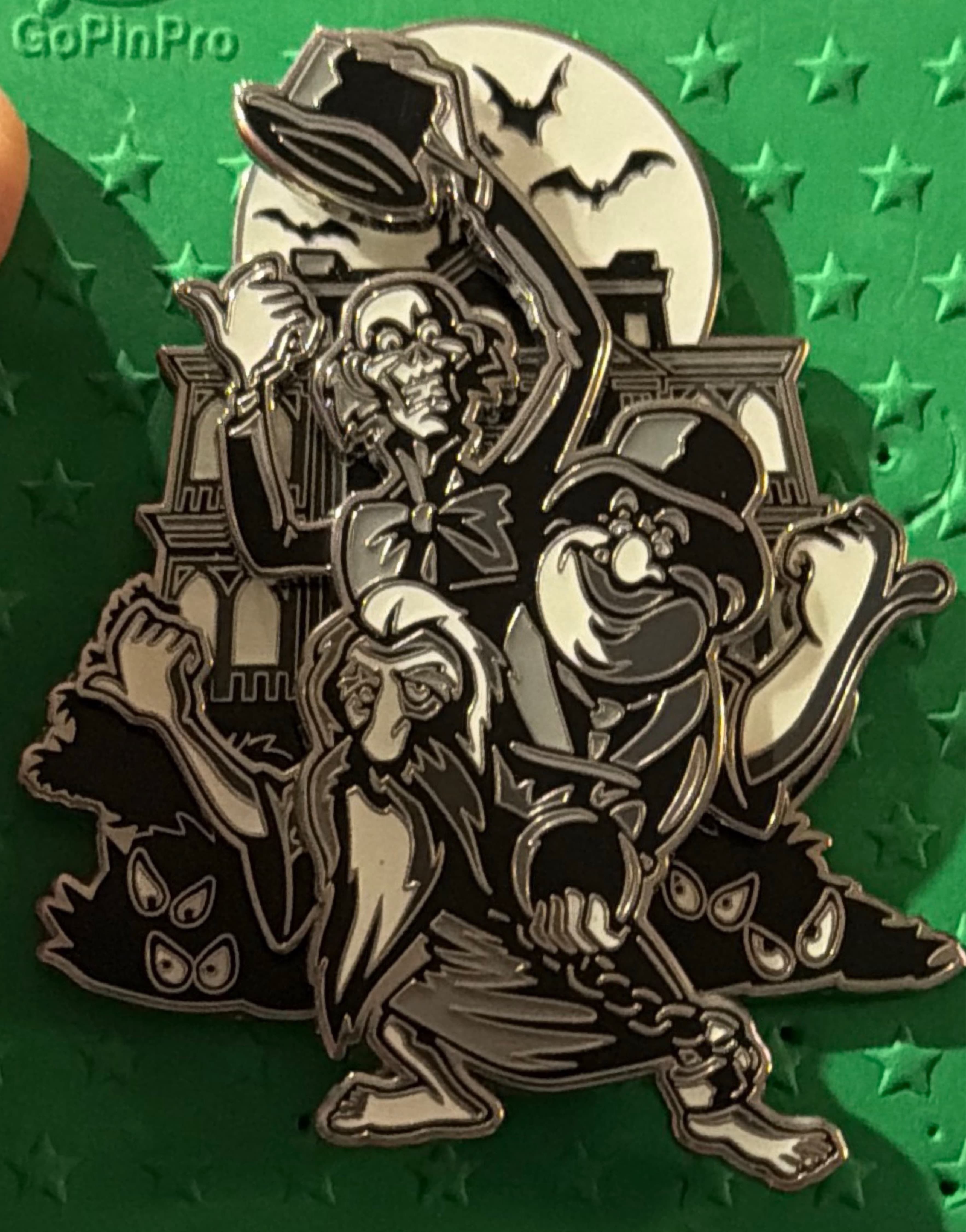 Loungefly The Haunted Mansion Hitchhiking Ghosts Swinging Glow-in-the-Dark Pin front