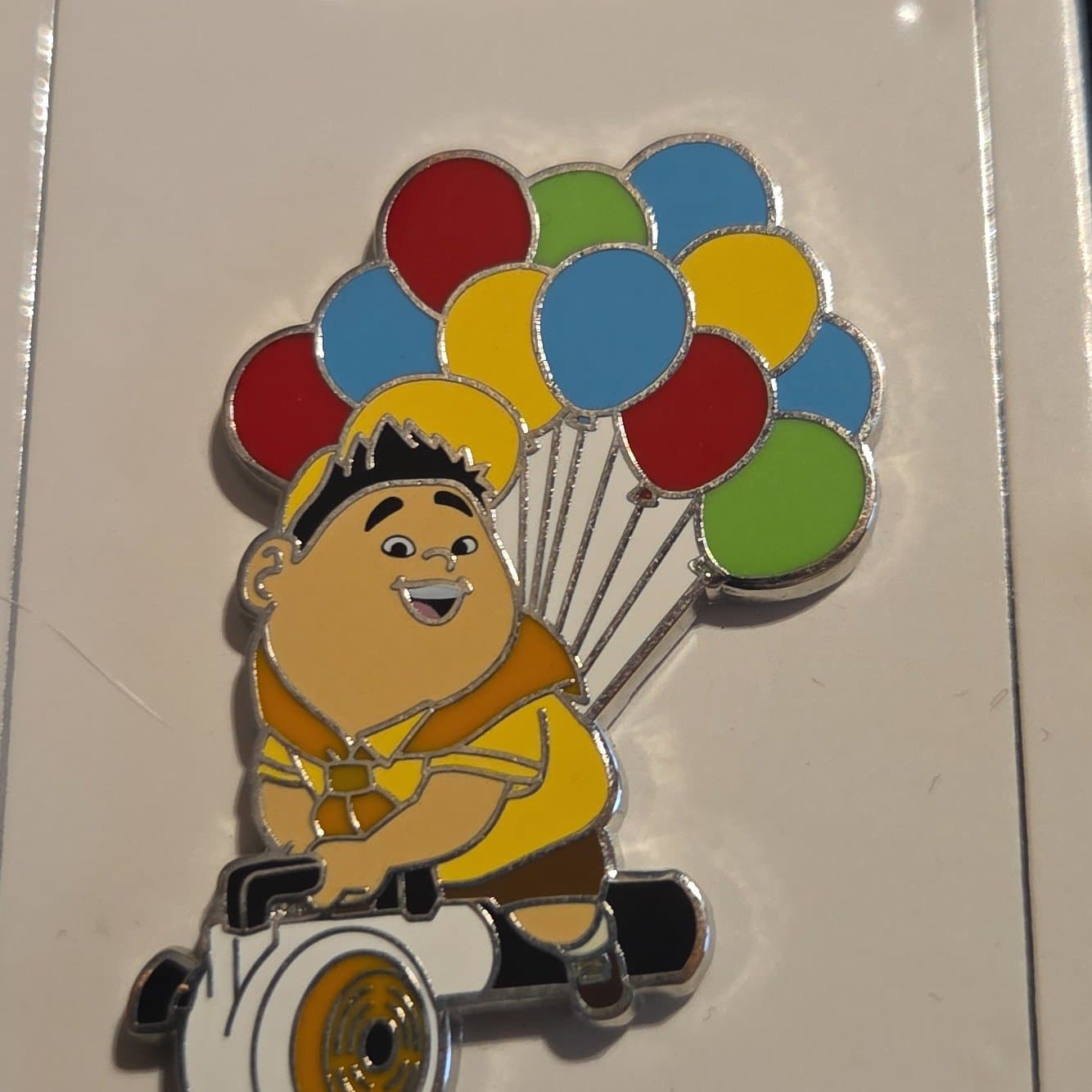 Russell Riding a Leaf Blower with Balloons - Up front