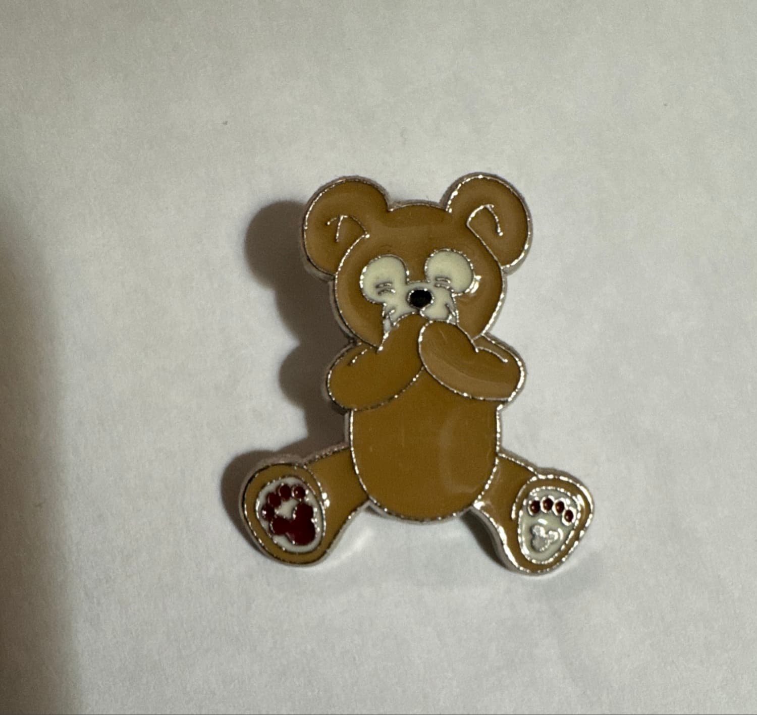 Duffy The Bear Laughing Hands Over Mouth front