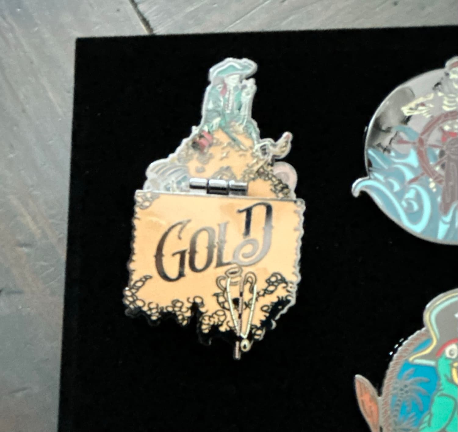 All That Glitters Be Not Gold Pirates of the Caribbean Hinged Pin front