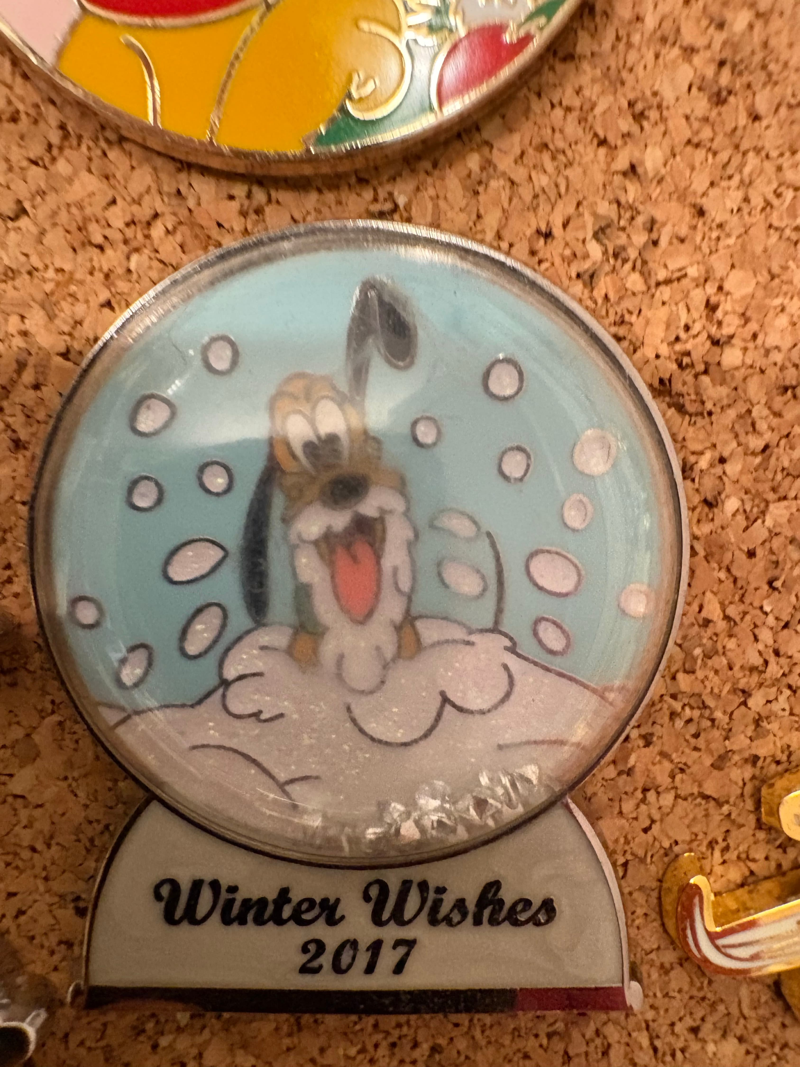 Pluto Winter Wishes 2017 Snow Globe Pin front