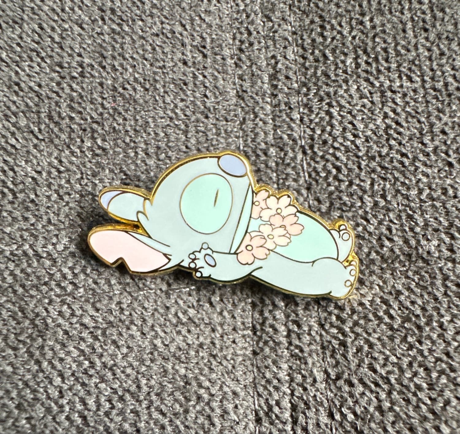 Sleeping Stitch with cherry blossom Lei front