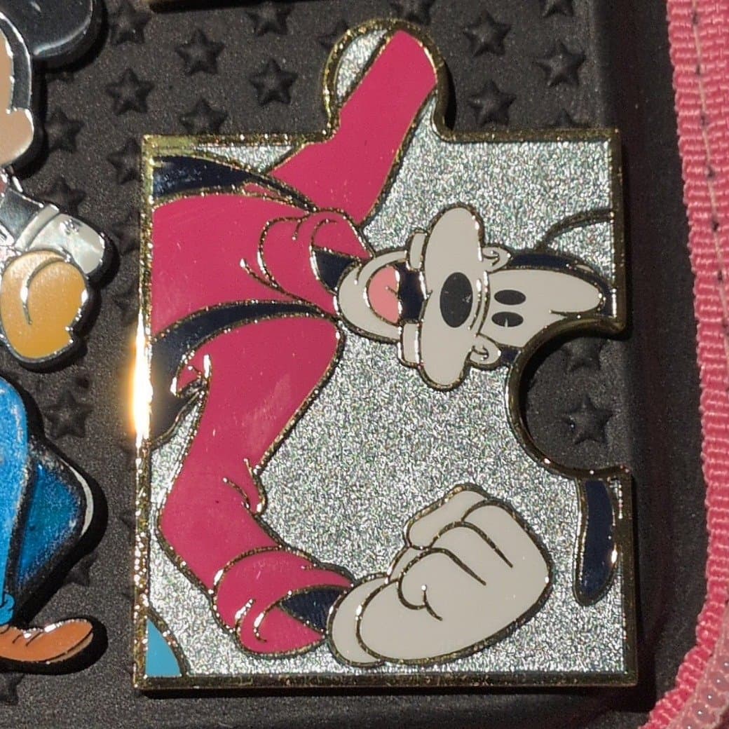 Goofy Glittered Puzzle Piece Pin front