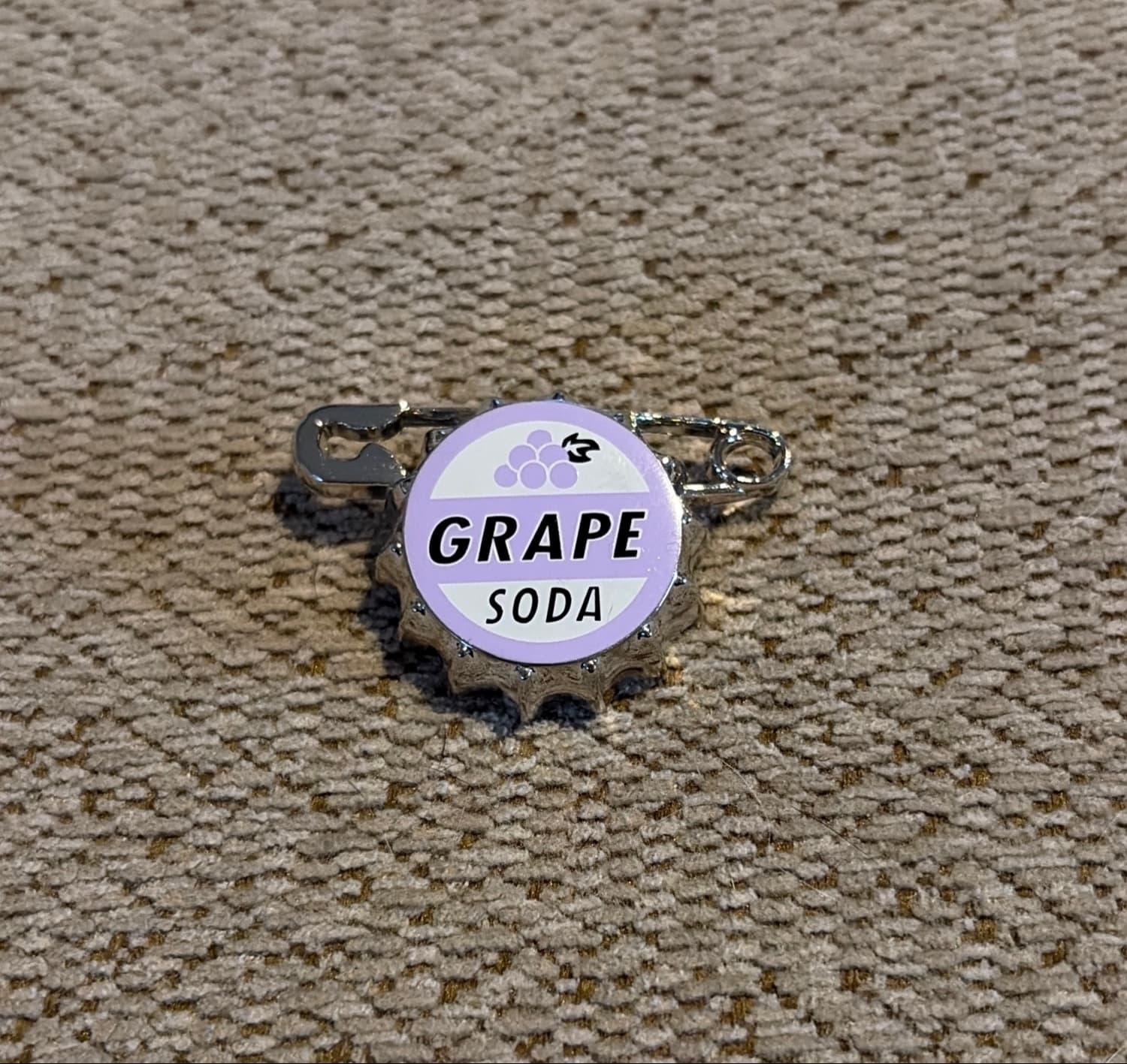 Ellie's Grape Soda Bottle Cap Pin - Up front