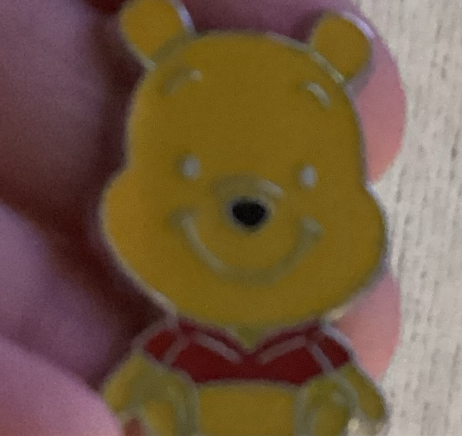 Winnie the Pooh Smiling Face Red Shirt Pin front