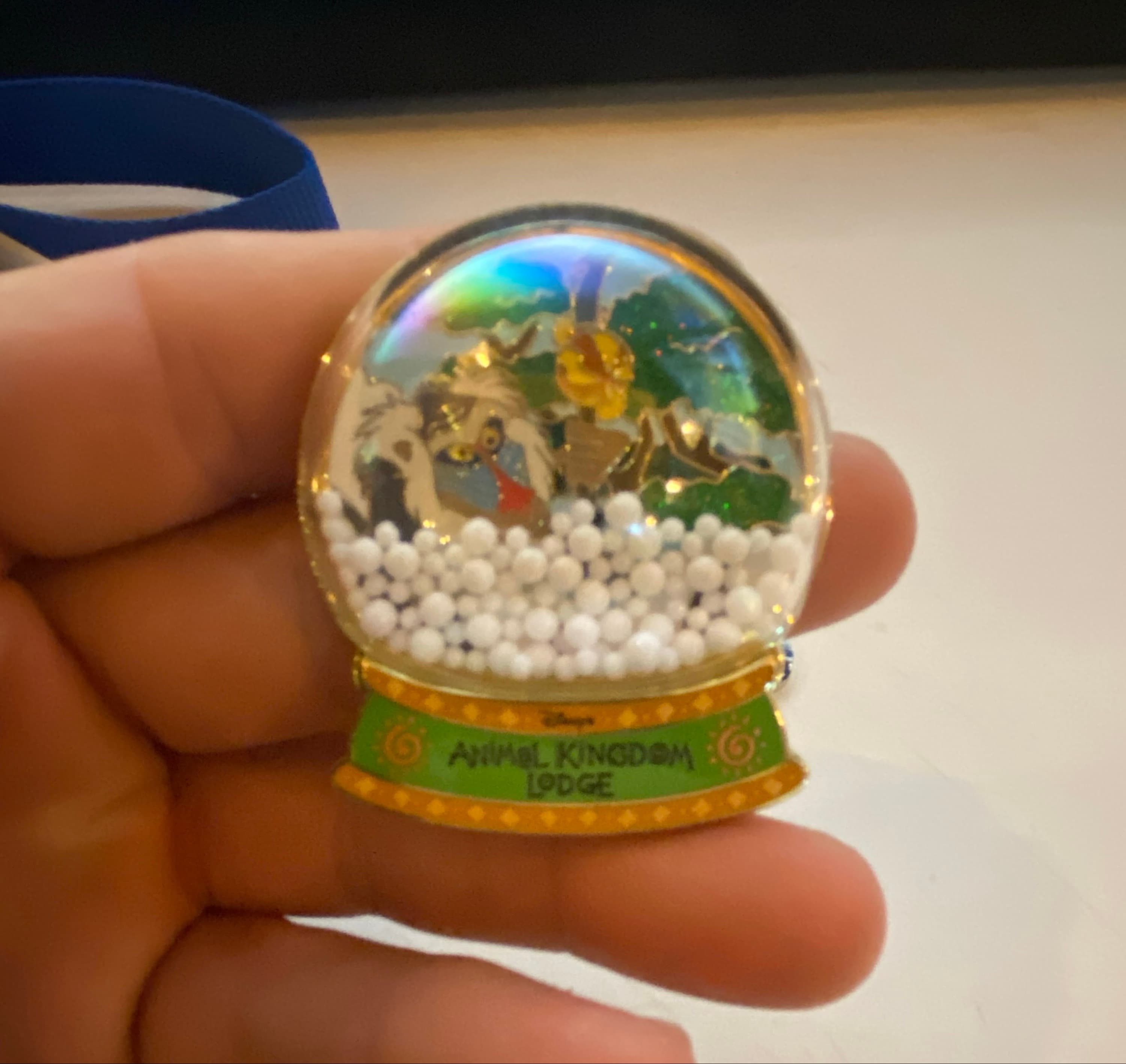 Disney Parks 2025 Animal Kingdom Lodge Lion King Rafiki Holiday Snow Globe Pin front