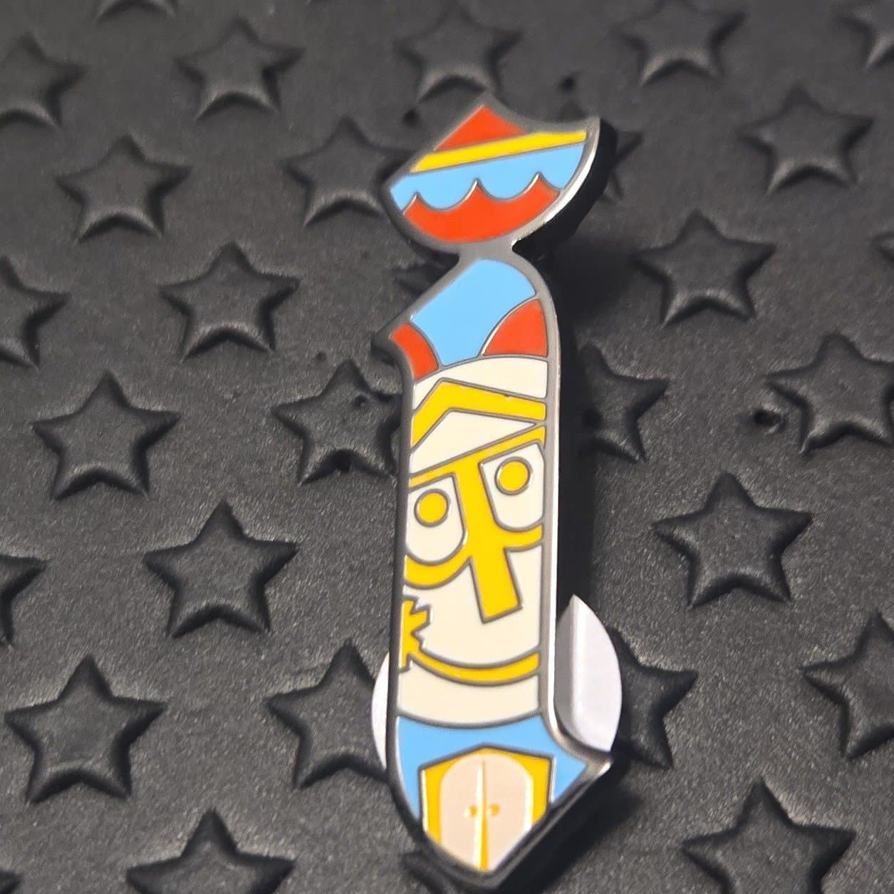 it's a small world Stylized 'i' Character Alphabet Pin front