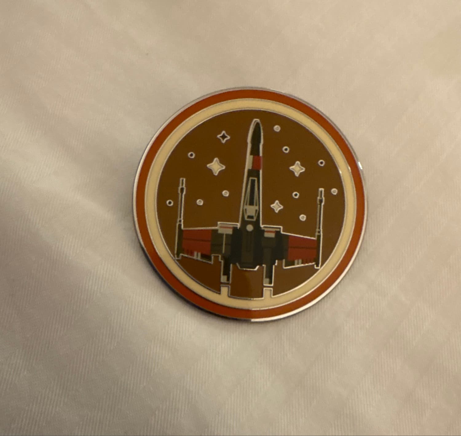 Star Wars: The Rise of Skywalker Poe Dameron's X-Wing Fighter Pin front