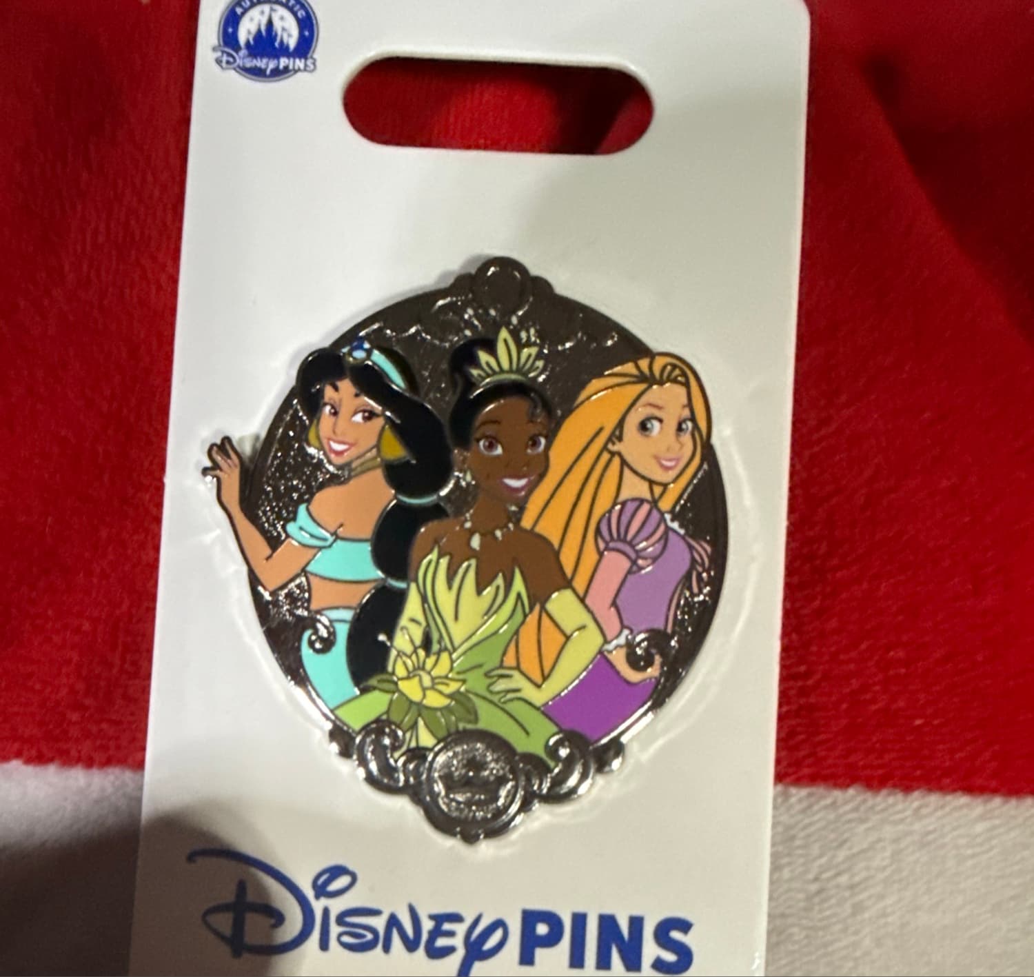 Jasmine, Tiana, and Rapunzel Cluster Pin front