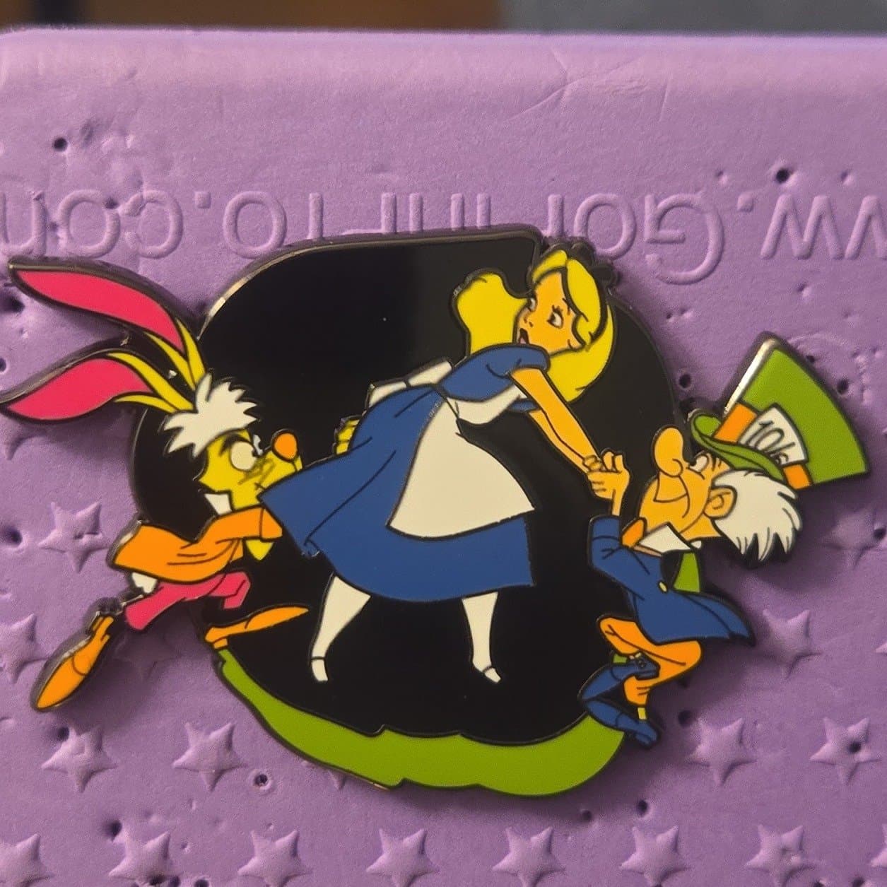neon alice in wonderland front