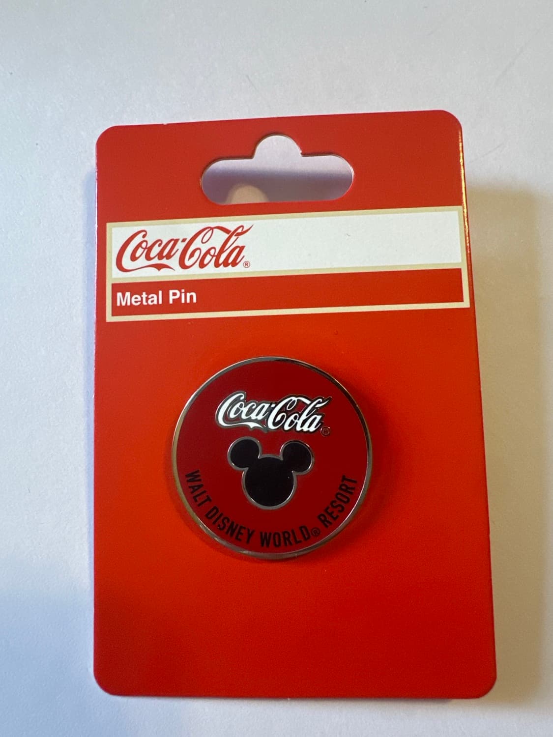 Coca-Cola Disney World resort pin front