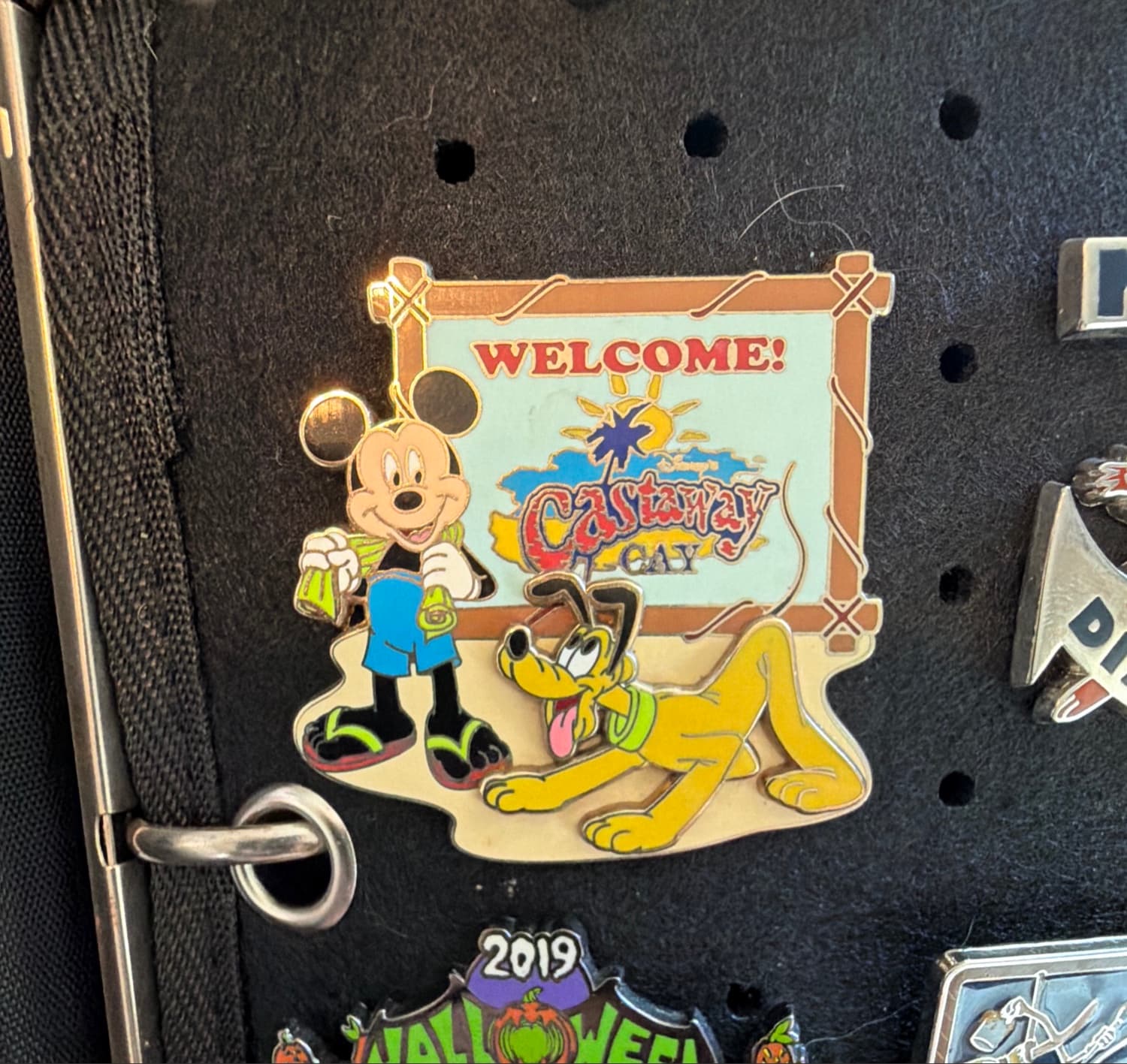 Castaway Cay Sign with Mickey and Pluto front