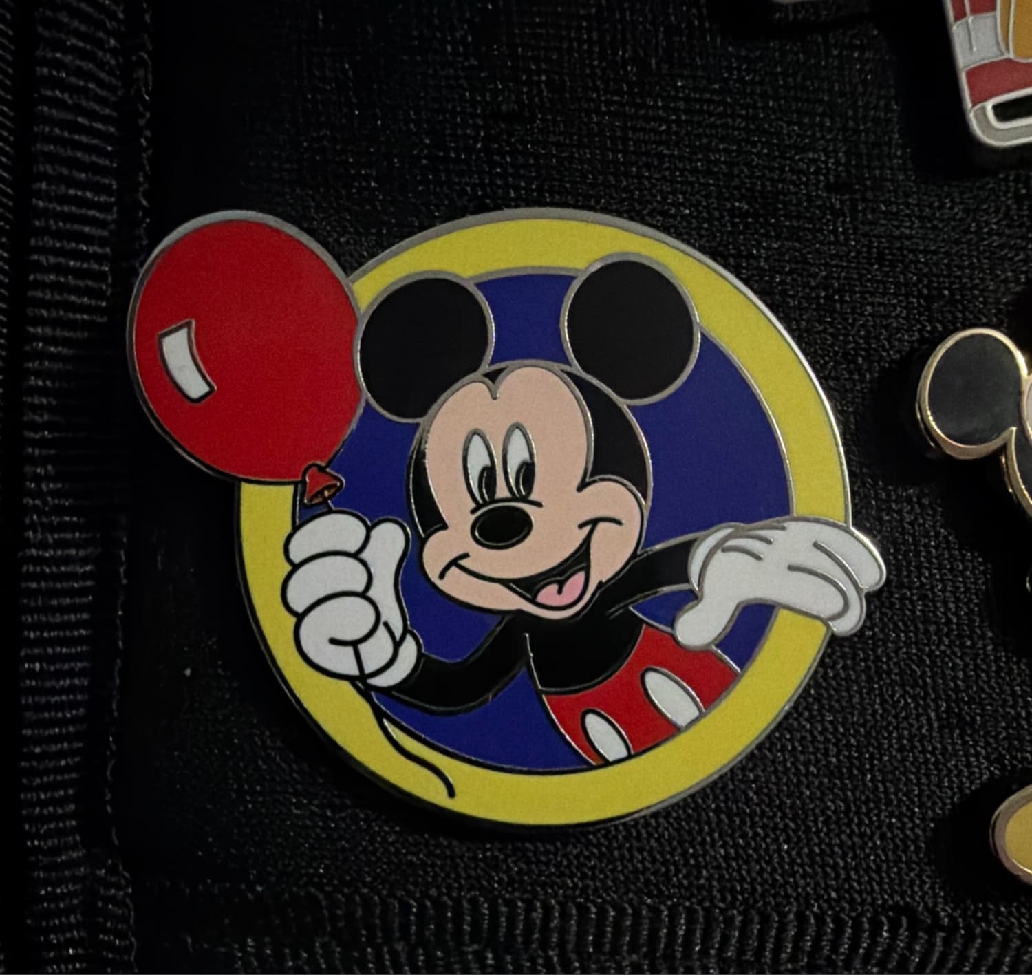 Mickey Mouse Holding Red Balloon in Mickey Icon Frame front