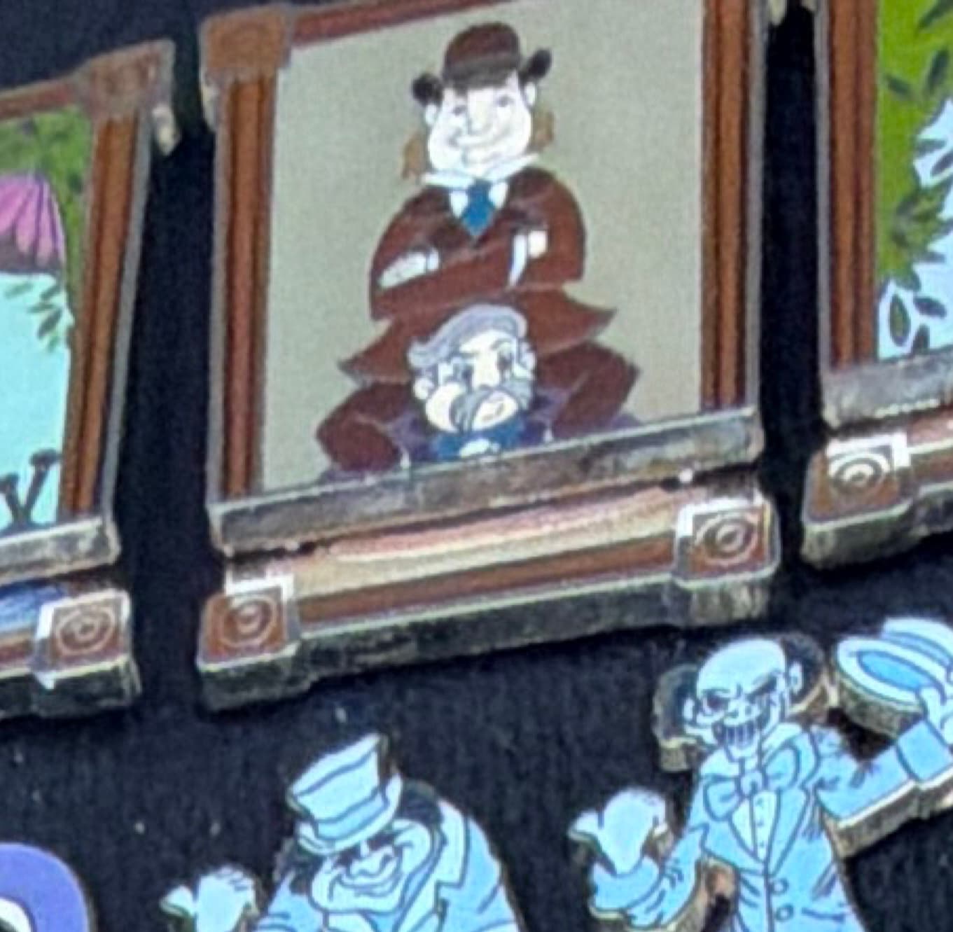 Haunted Mansion Quicksand Men Stretching Portrait Sliding Enamel Pin front