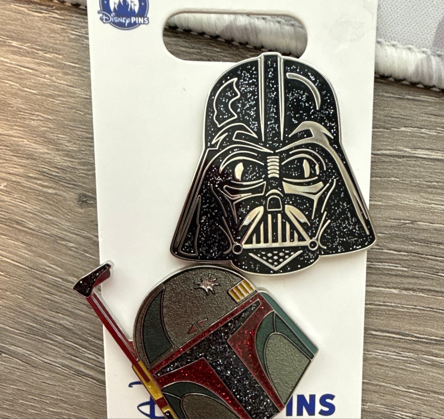 2025 Darth Vader & Boba Fett Helmet Glitter Pin Set front
