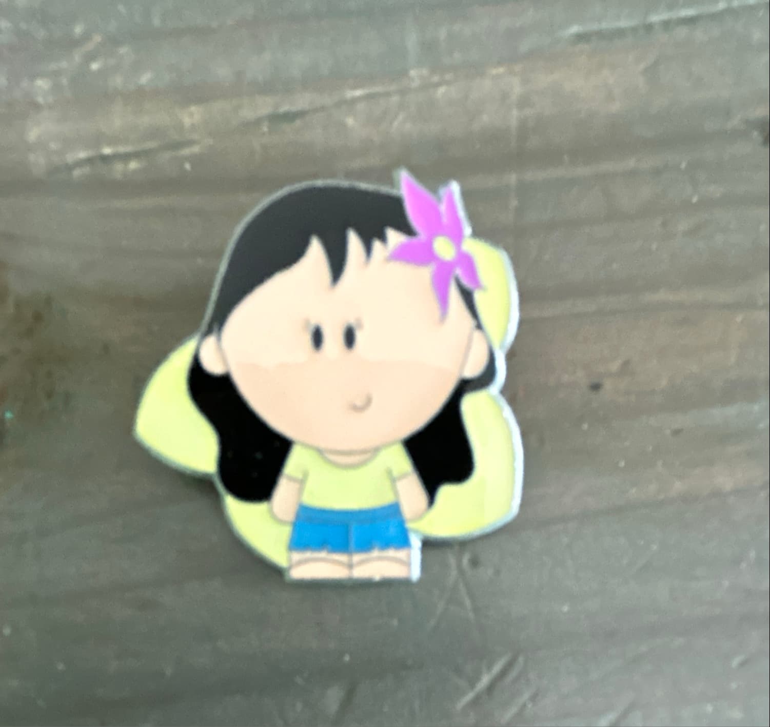 Stylized Hawaiian Girl with Purple Flower Pin front