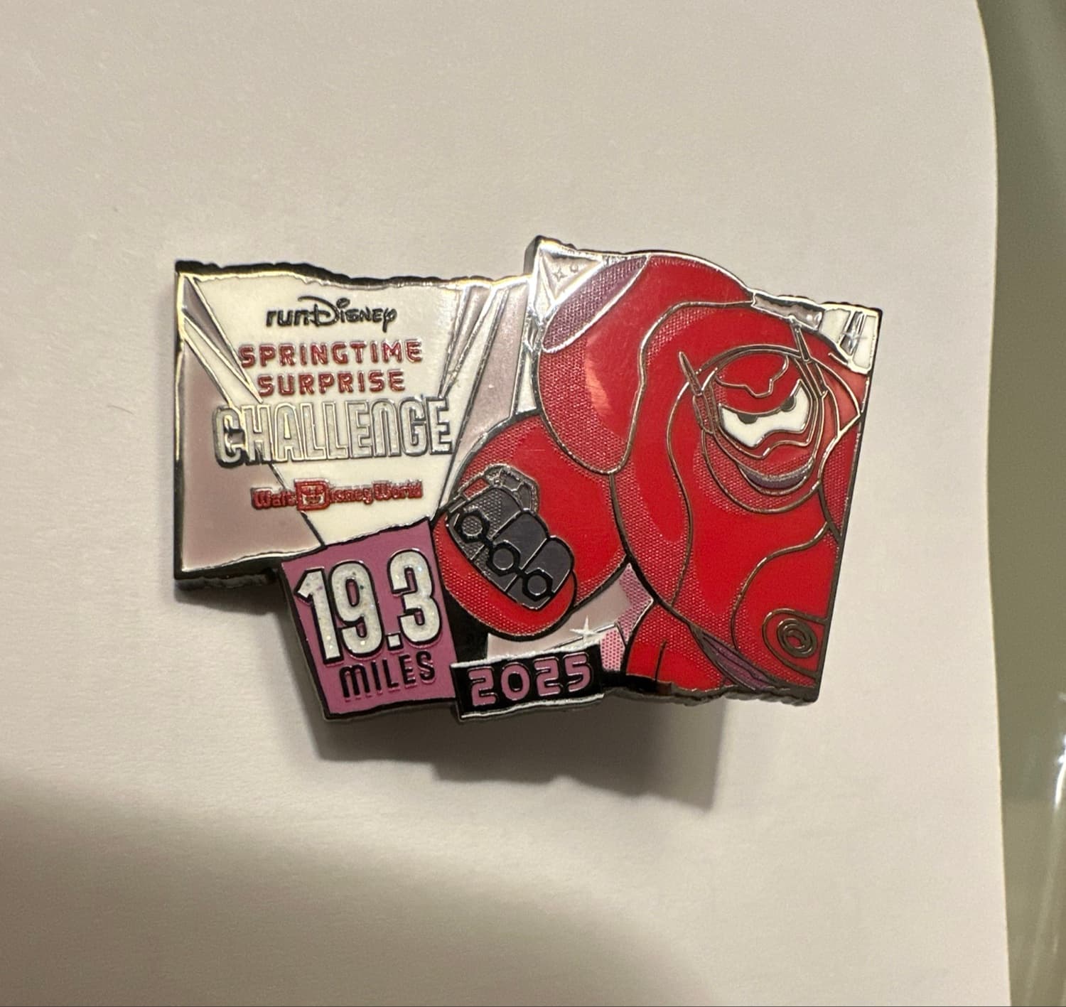 runDisney Springtime Surprise Challenge 2025 Baymax 19.3 Miles Slider Pin front