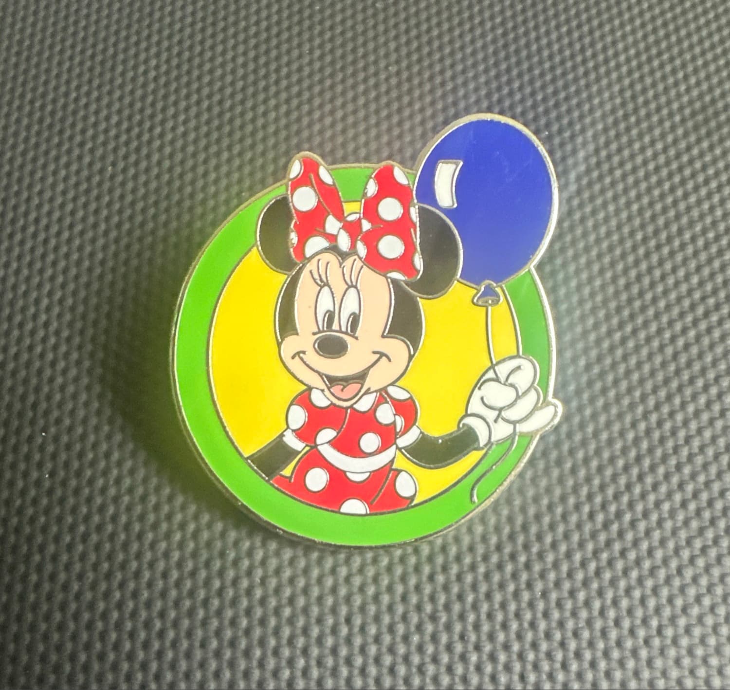 Minnie Holding a Blue Balloon front