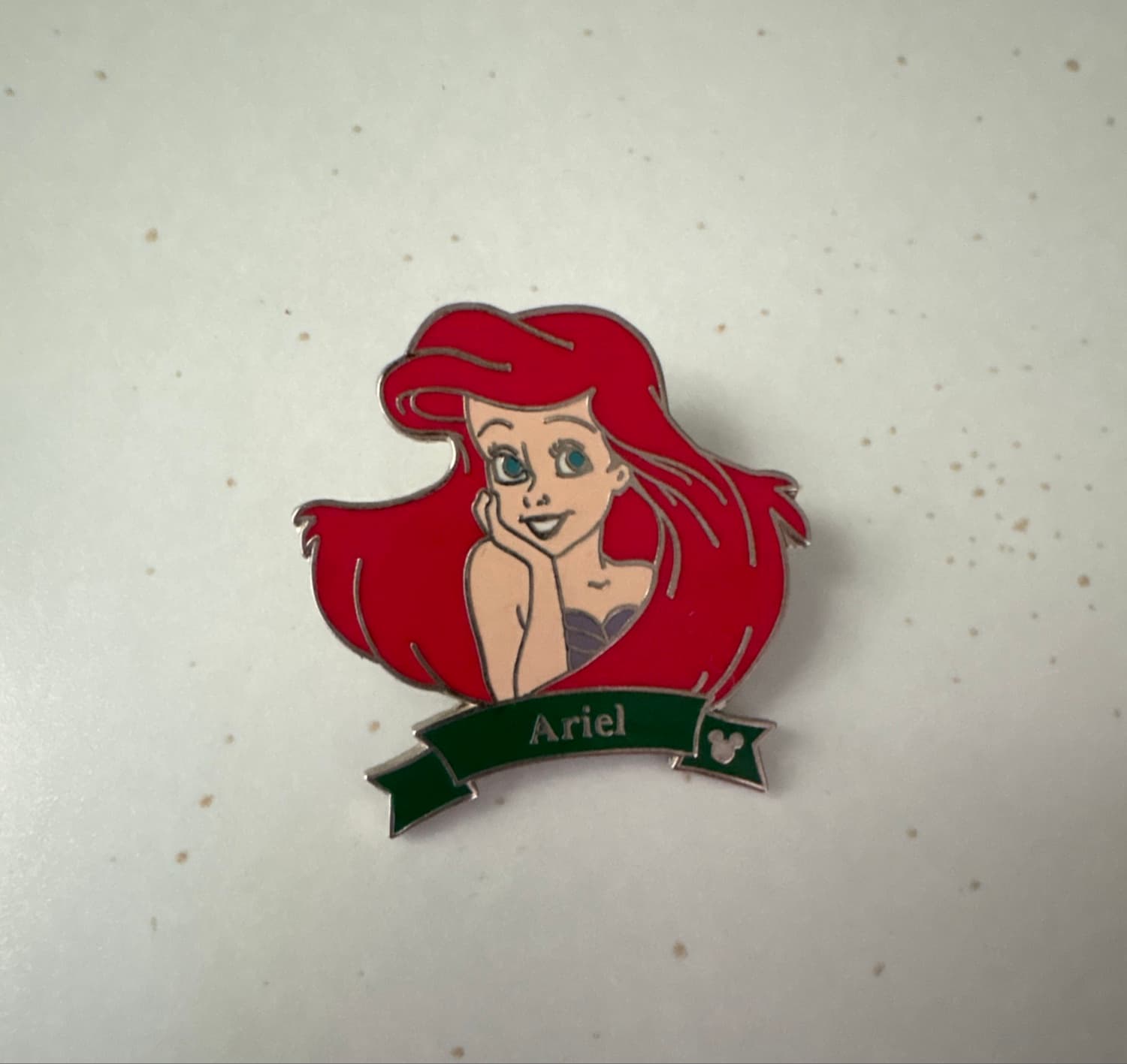 Ariel Hidden Mickey Green Ribbon Name Pin front