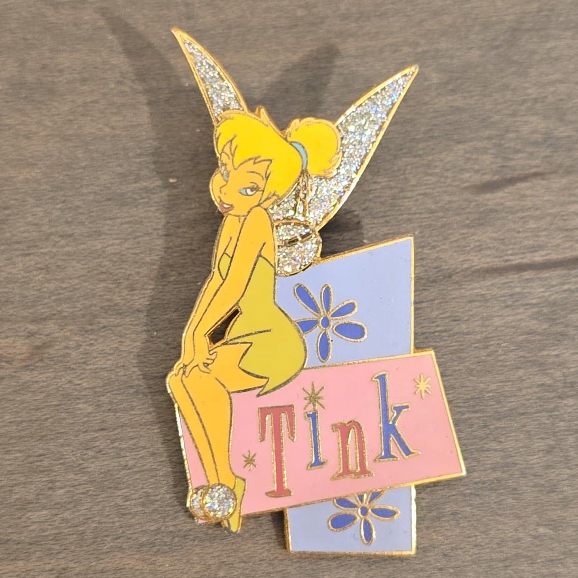 Tinker Bell Sitting on 'Tink' Angled Block with Glitter Wings front