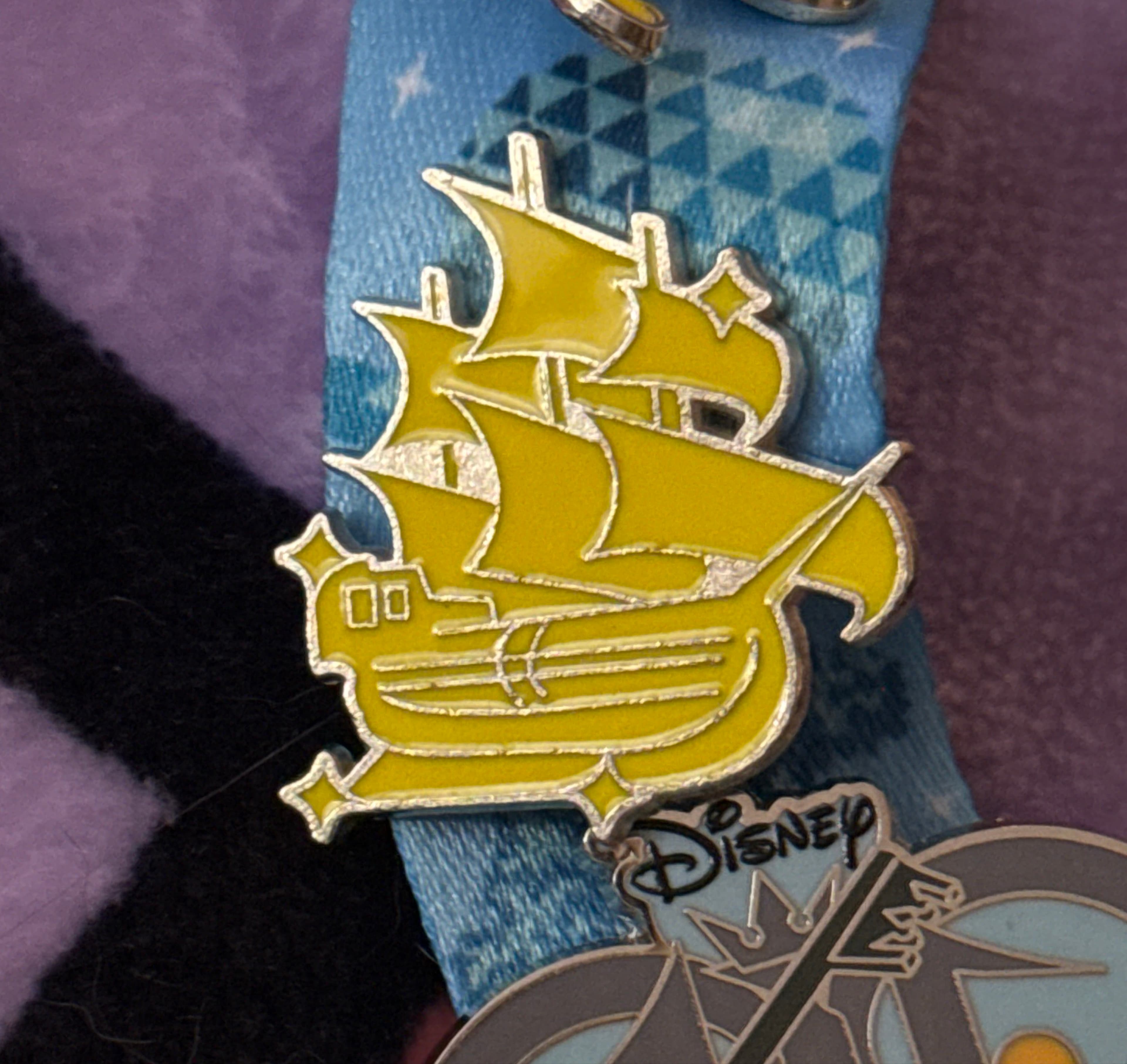 Peter Pan Pirate Ship Icons Yellow Sails Pin front