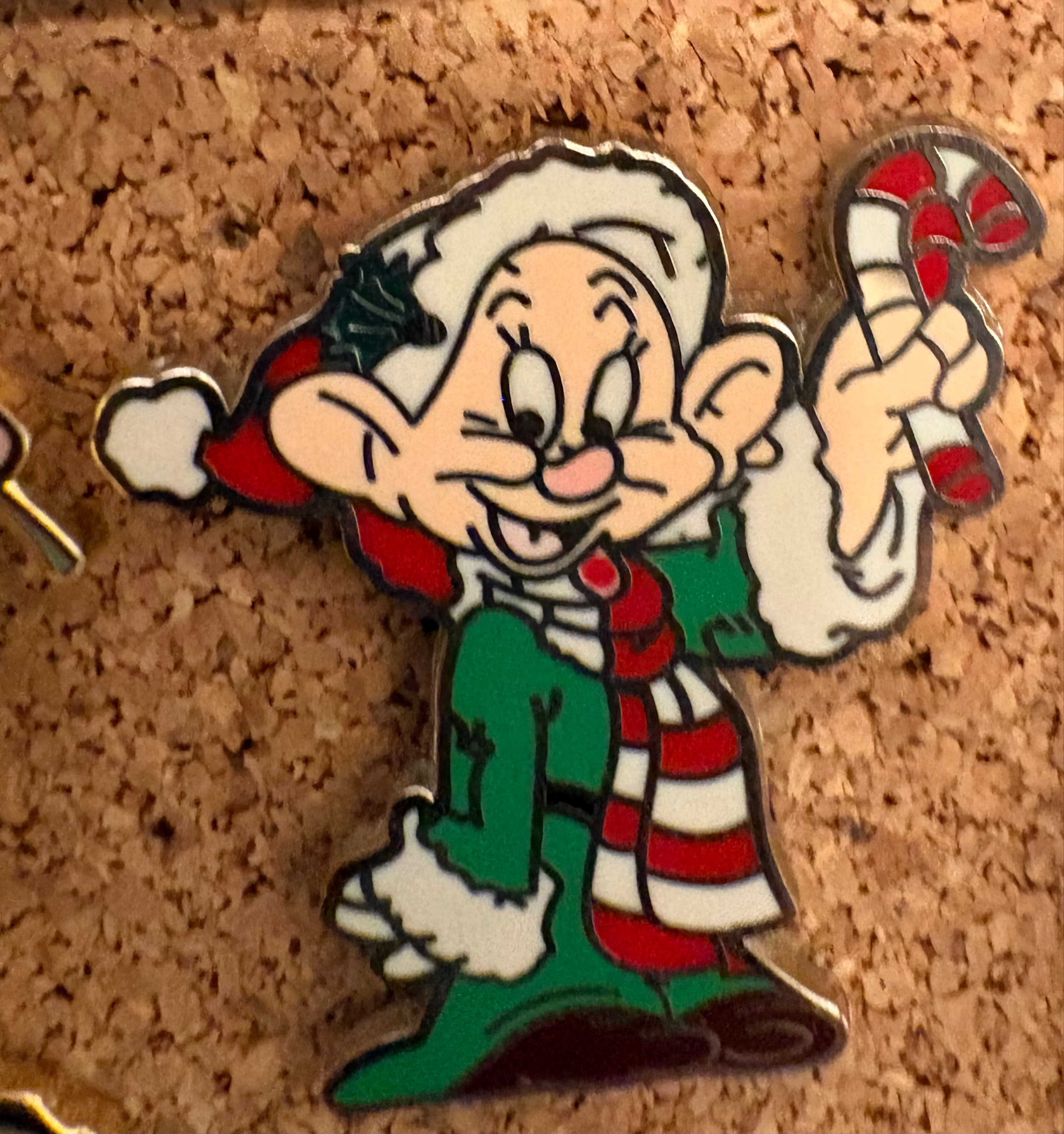 Dopey holding a Candy Cane front