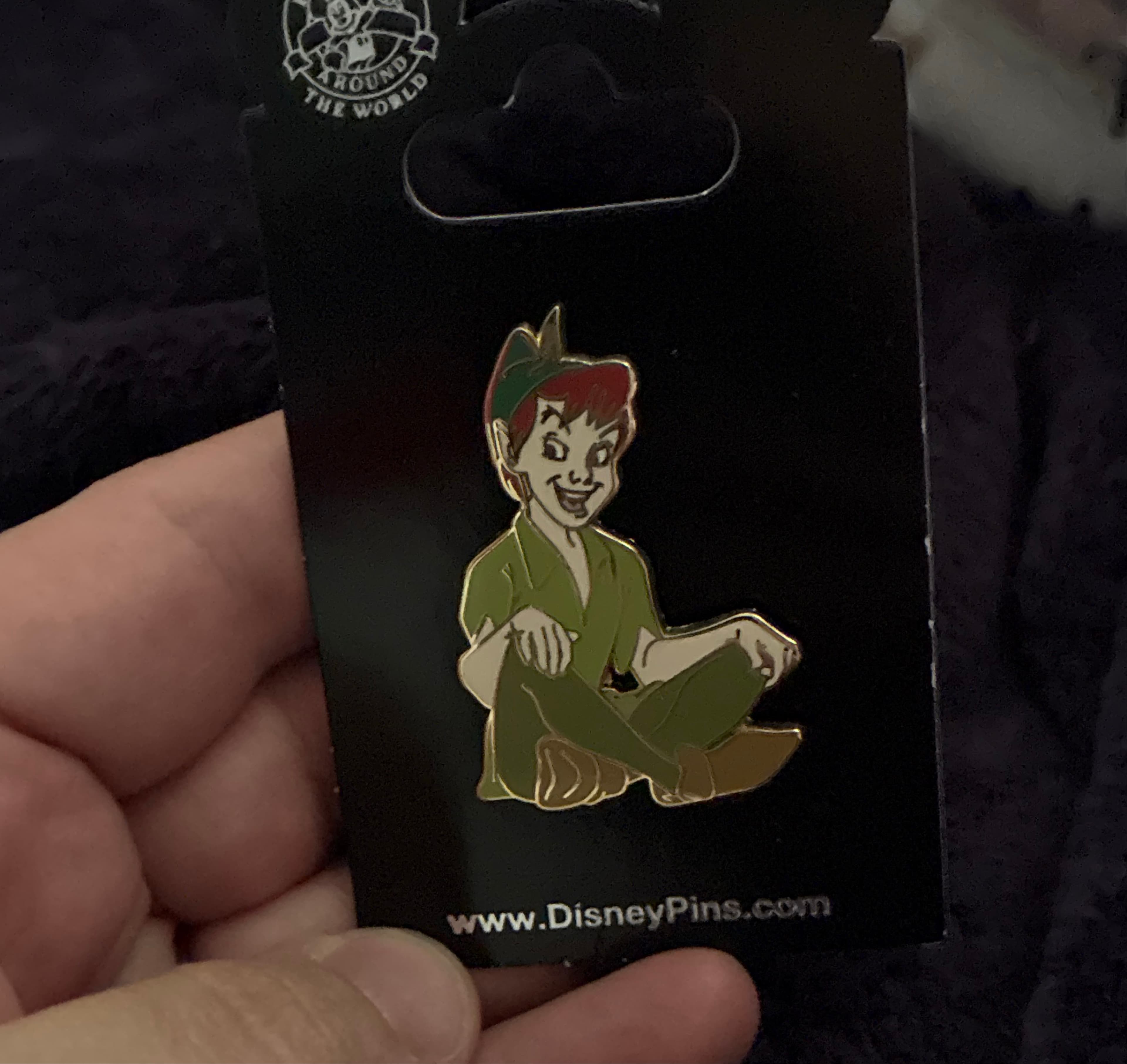 Peter Pan Sitting Cross Legged front