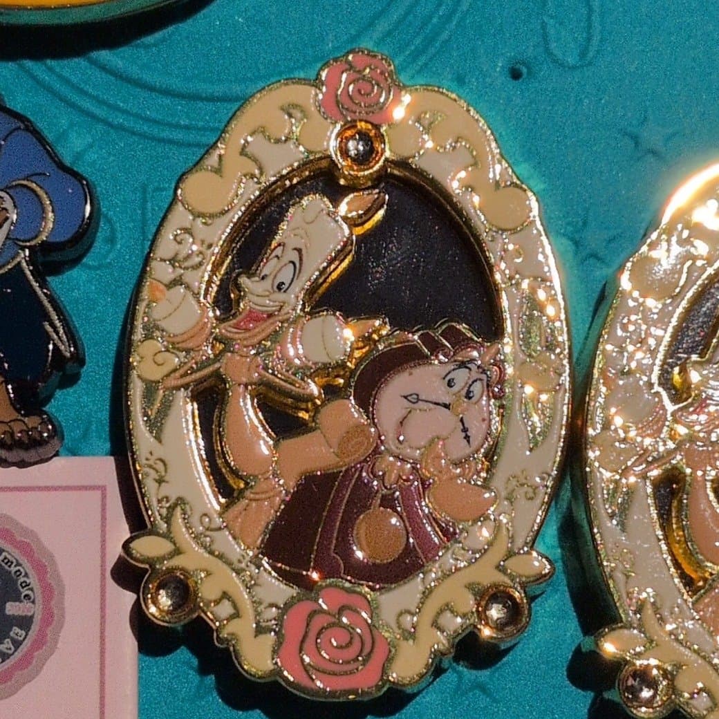 Beauty and the Beast Lumiere and Cogsworth Ornate Rose Frame Pin front